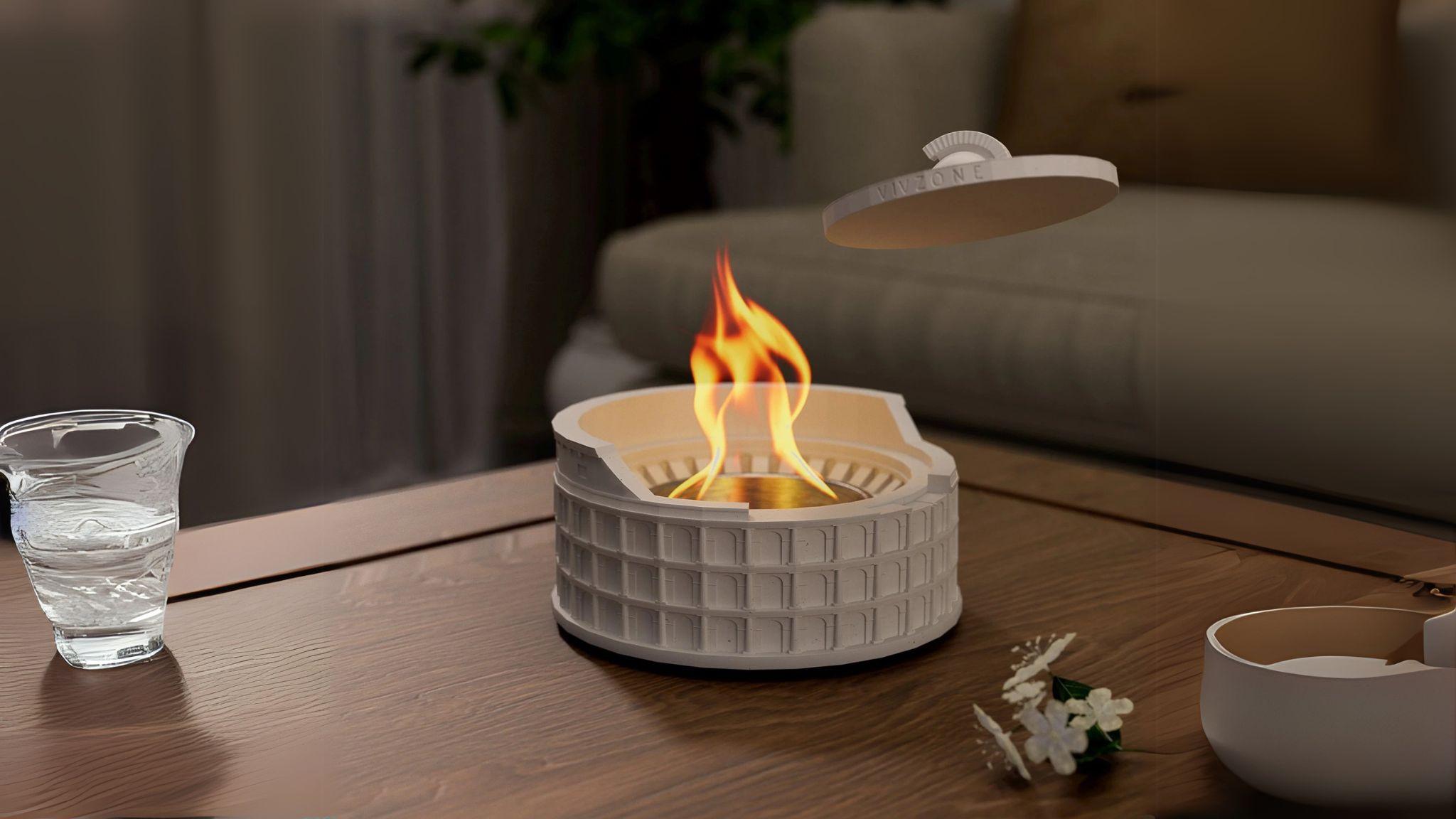 Colosseum Tabletop Fire Pit with clean-burning flame, portable concrete design, perfect for indoor and outdoor ambiance.