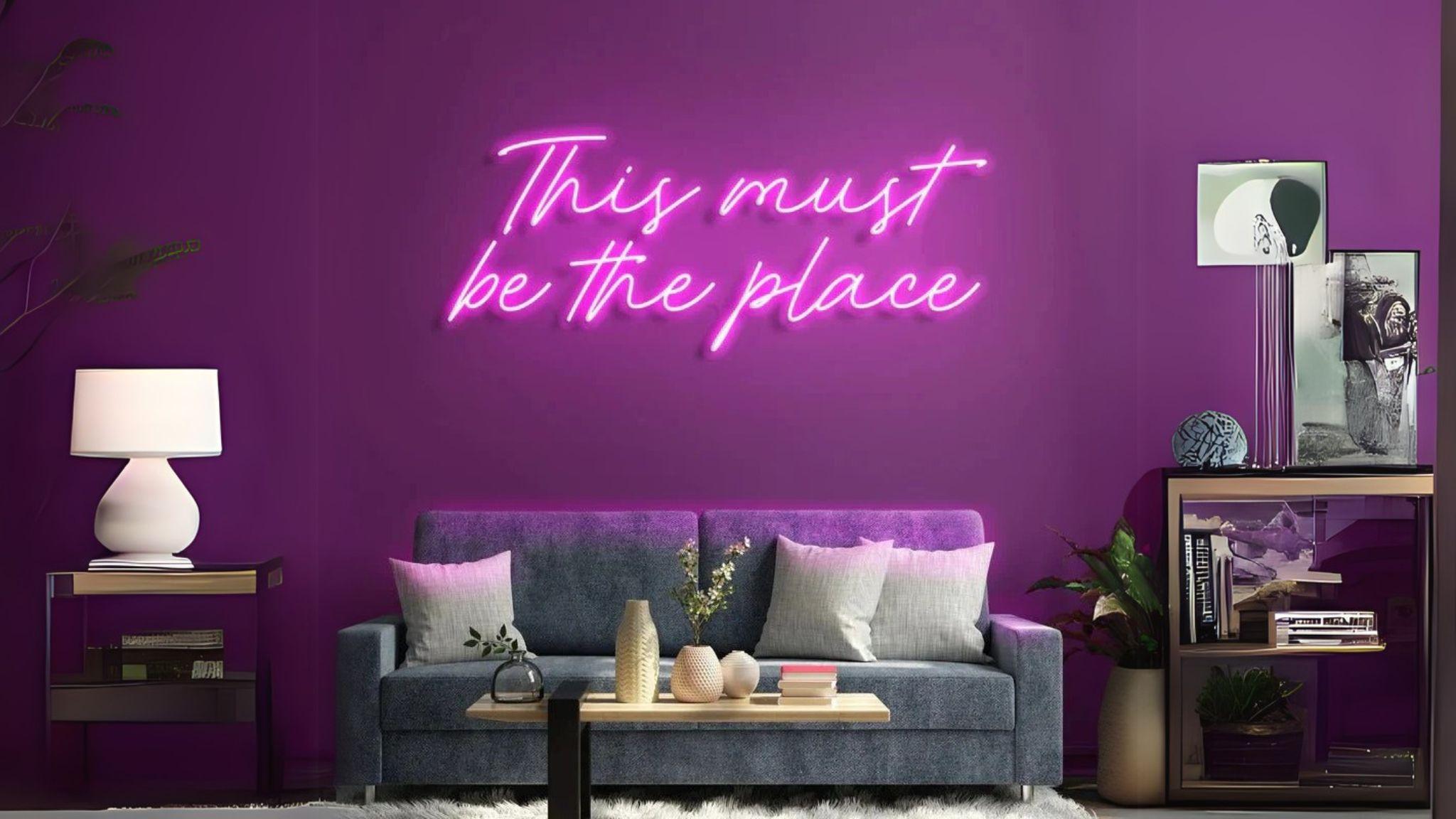Smart Neon Sign Light, flexible DIY neon strip light glowing pink above modern living room sofa.