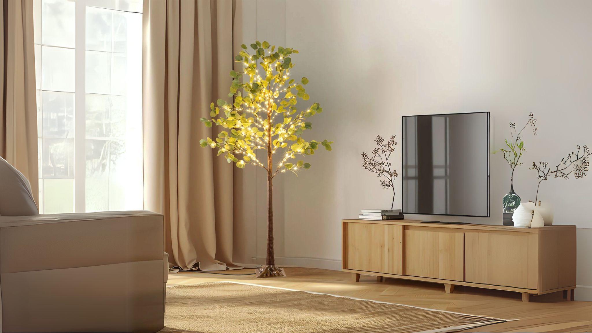 Lighted Eucalyptus Tree with LED Fairy Lights, 5.9ft adds warm, elegant illumination and botanical charm indoors or outdoors.