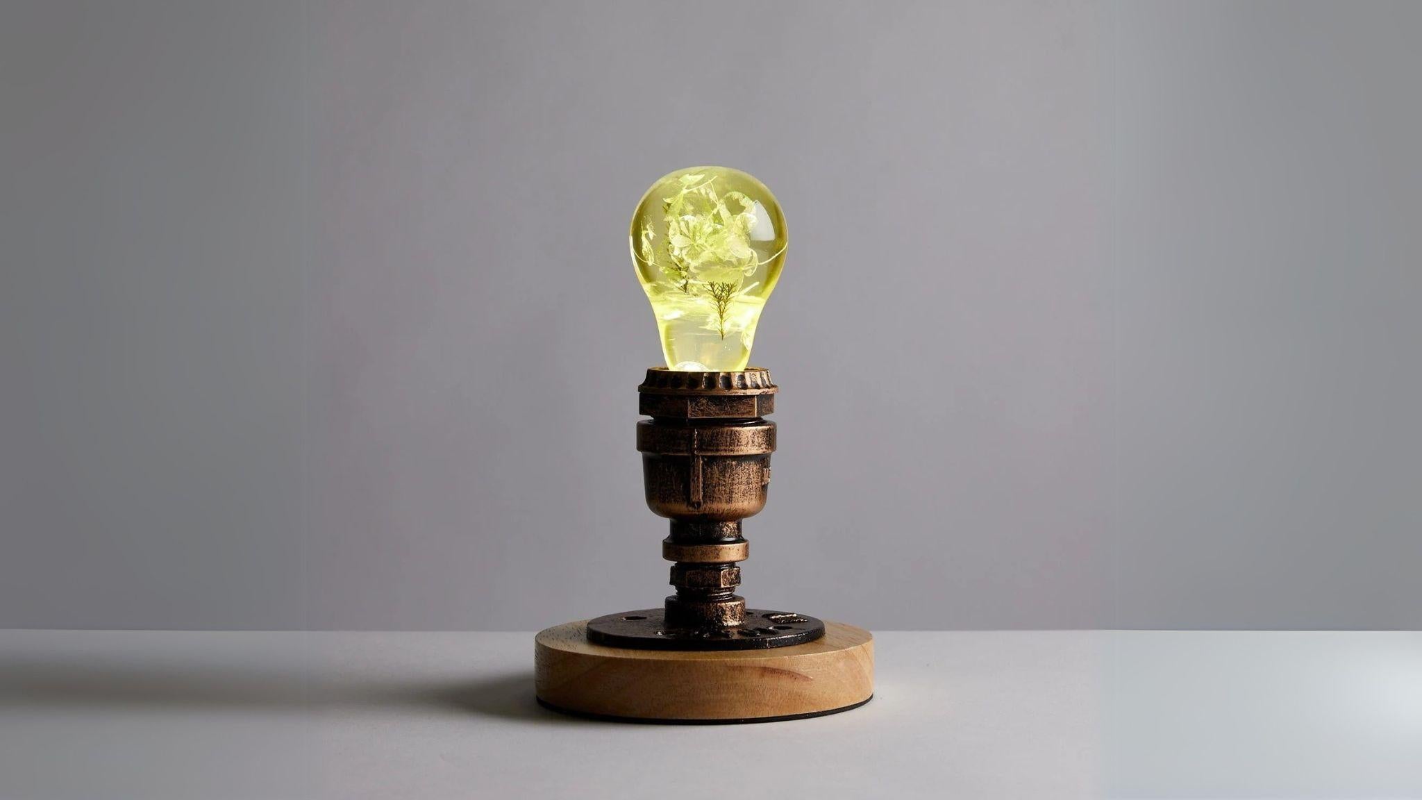 EP Light - Yellow Hydrangea handcrafted LED lightbulb with unique floral design brightening any room with warm energy.