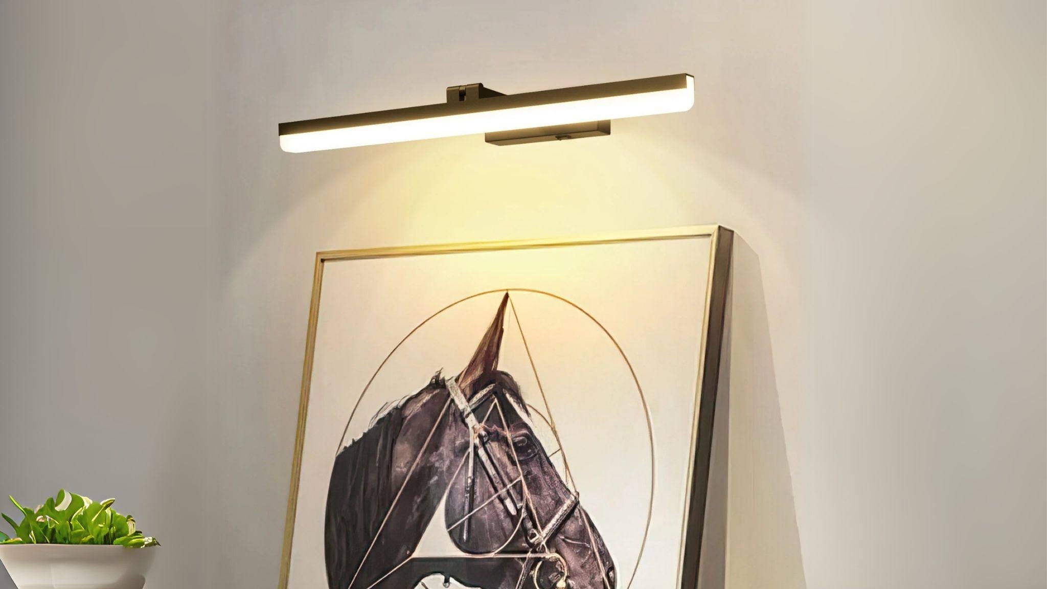 Rechargeable Wireless Picture Wall Light illuminating framed horse artwork with warm, battery-powered wireless LED glow.