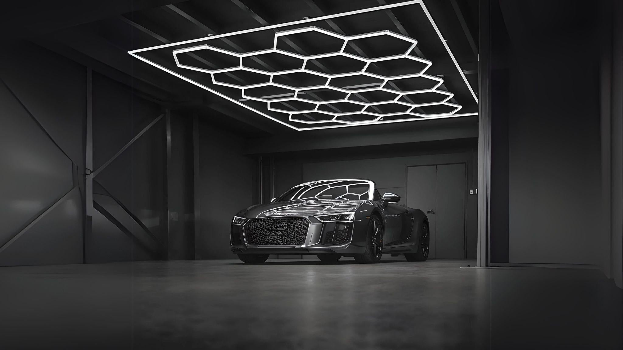 LED Hexagon Light illuminating a sleek modern garage with dynamic, bold geometric ceiling design.