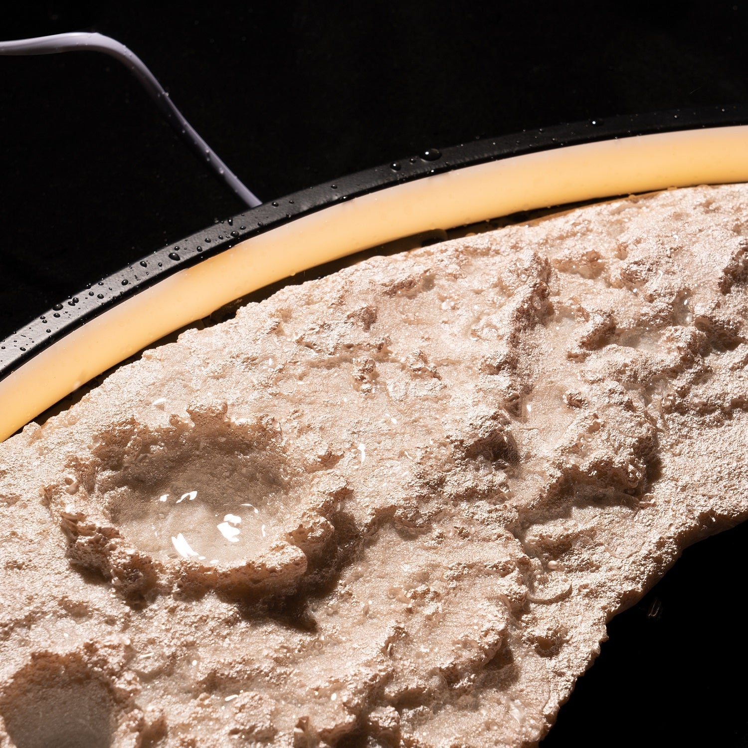 Close-up of 3D Moon Indoor & Outdoor Wall Lamp showcasing detailed lunar surface and soft warm glow lighting.