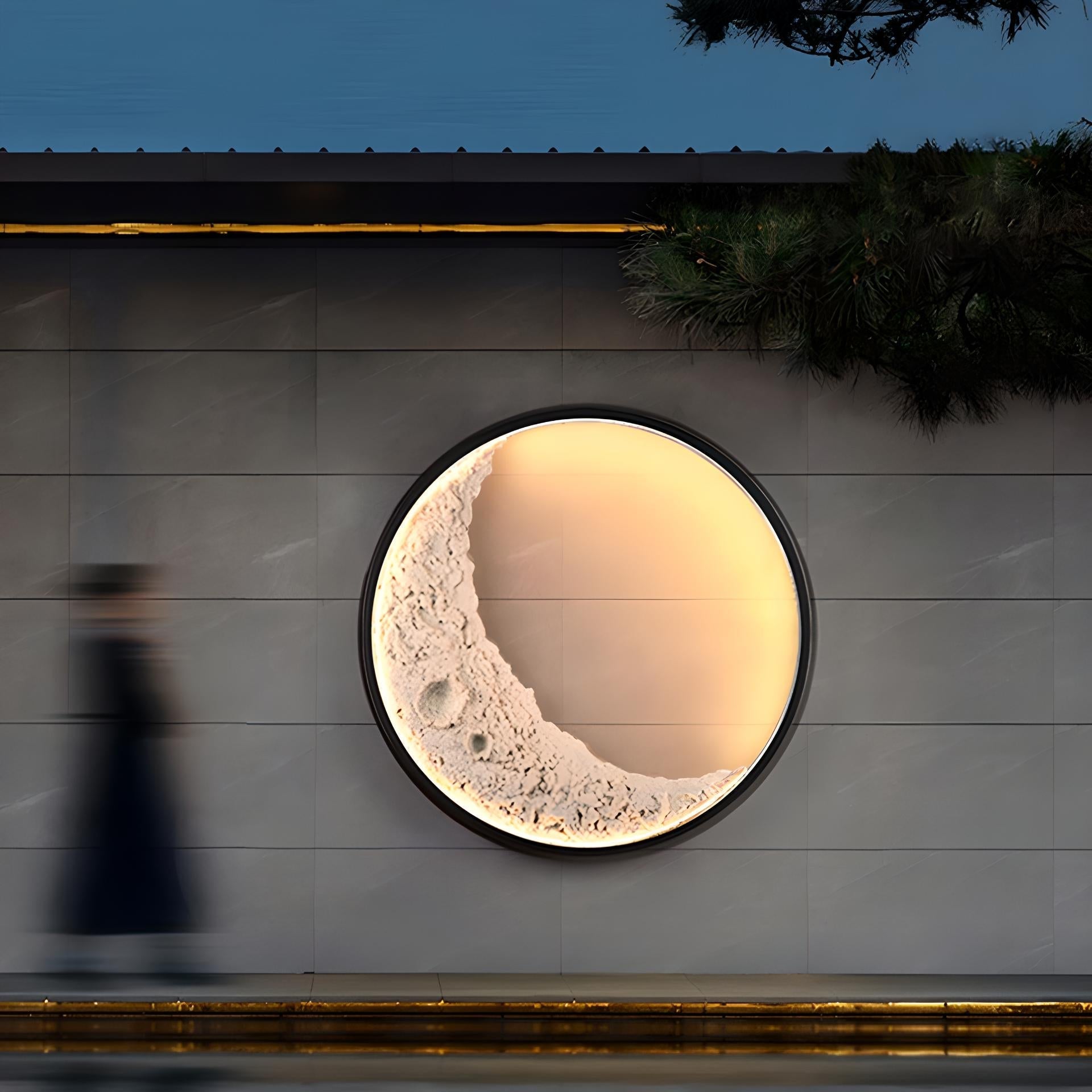 3D Moon Indoor & Outdoor Wall Lamp with detailed lunar design casting warm glow, perfect for stylish indoor or outdoor spaces.