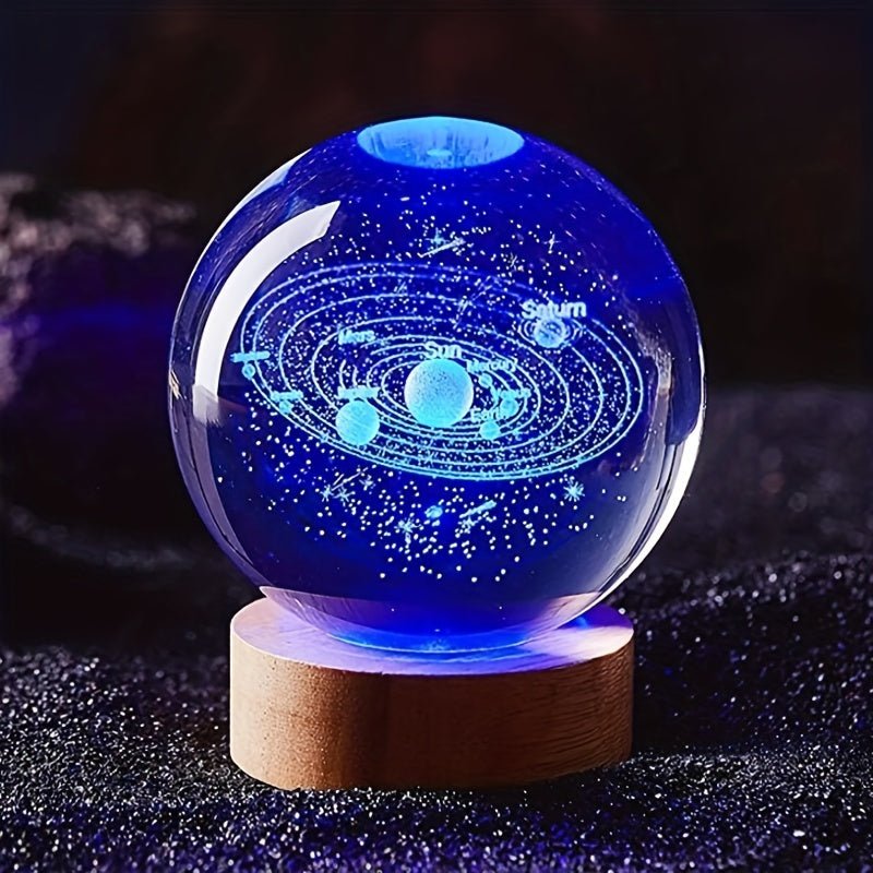 3D Solar System Crystal Ball Light showing the solar system with glowing planets on a wooden base.