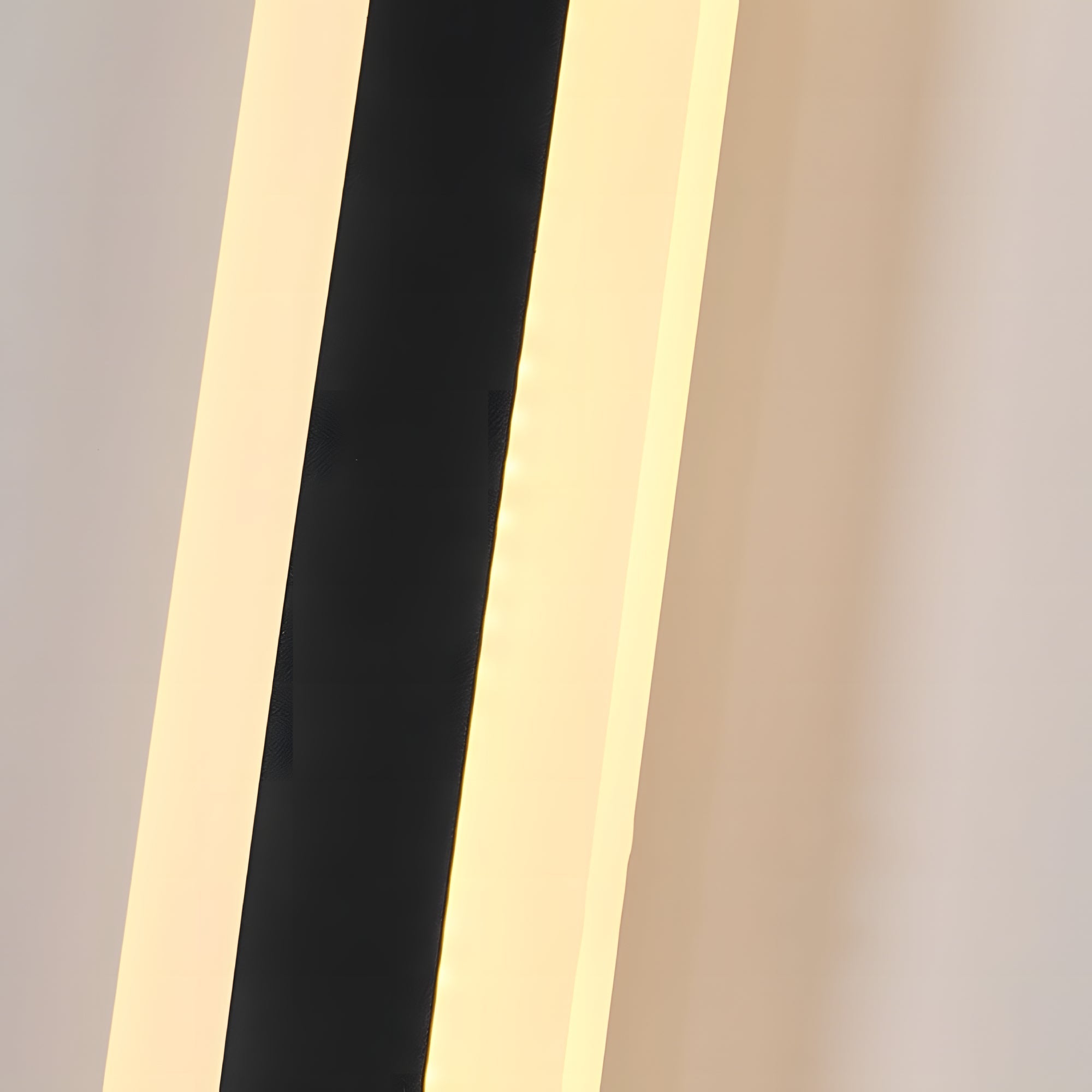 Close-up of 40” RGBW Frame Wall Light, 2 Pack showing warm white glow in sleek black and aluminum frame for indoor and outdoor use.