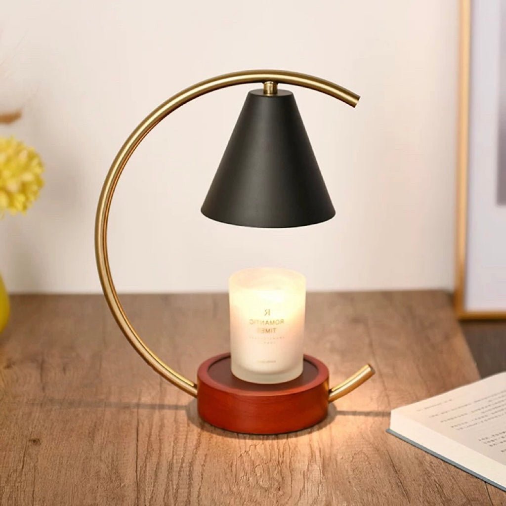 Aura Candle Warmer Lamp melting a candle safely with adjustable dimmer and timer for fragrance without flame or smoke.