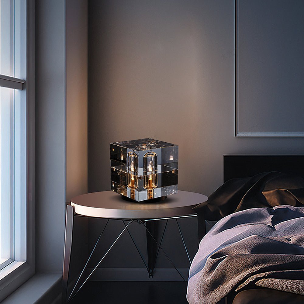 Crystal Bedside Table Lamp with crystal shade and brass base illuminating a modern bedroom nightstand.