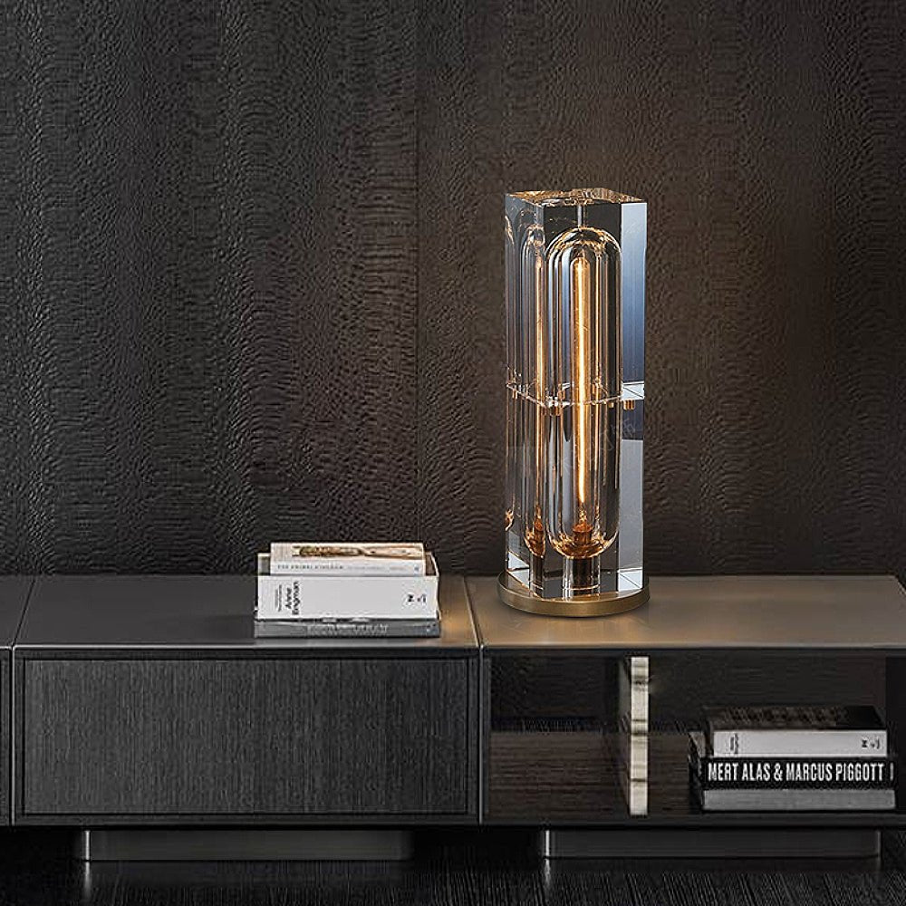 Crystal Bedside Table Lamp with crystal shade and brass base on modern dark wood surface.