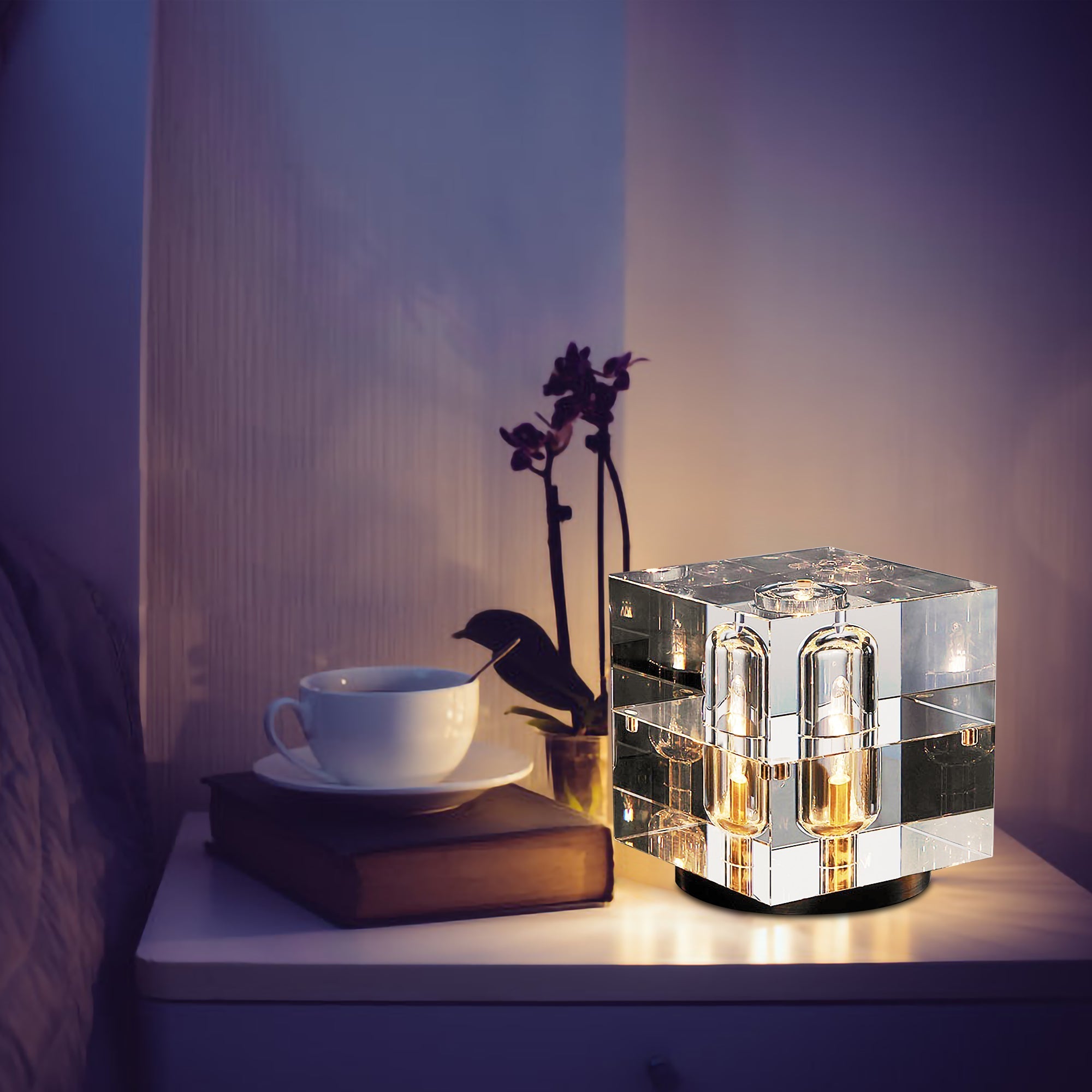 Crystal Bedside Table Lamp with a modern crystal design casting warm light on a bedside table for elegant ambiance.