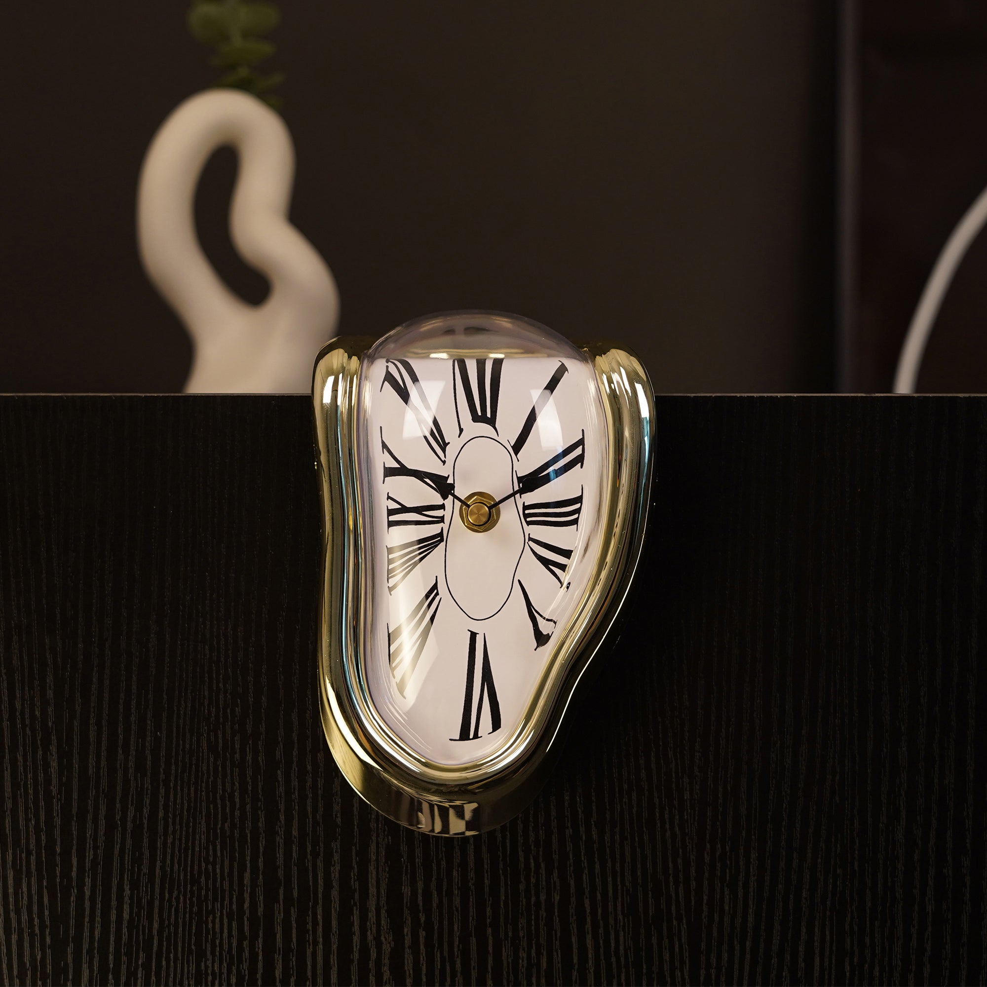 DALI Melting Clocks (2-Pack) featuring surreal melting design inspired by Persistence of Memory, perfect artistic shelf decor.