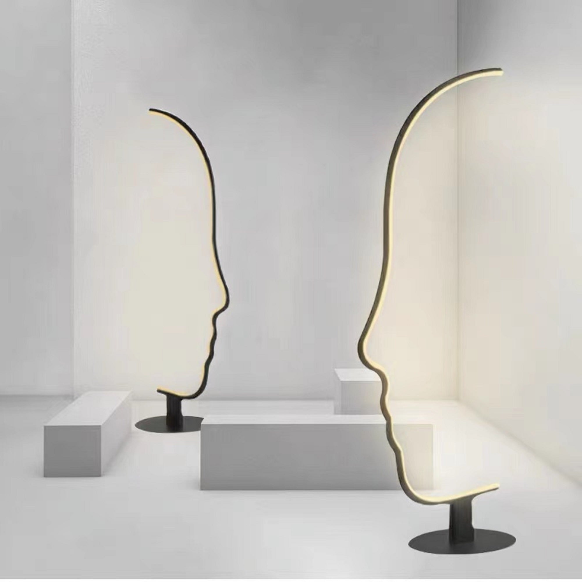 Edward Visage RGB Lamp with stylized human face silhouette, LED light, and customizable color effects for modern spaces.