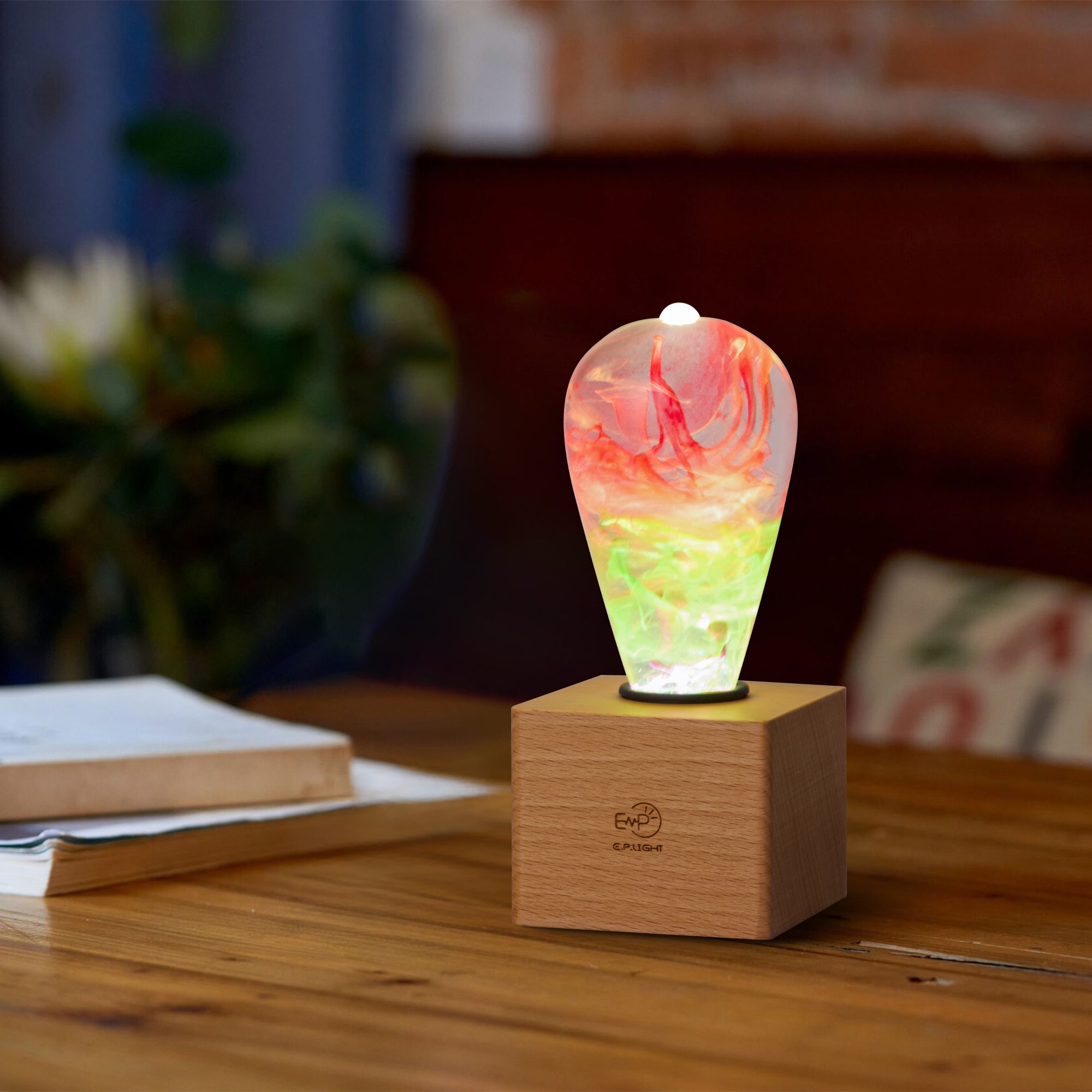 EP Light - Coral glowing on wooden base, handcrafted eco-resin LED bulb lighting up a cozy room ambiance