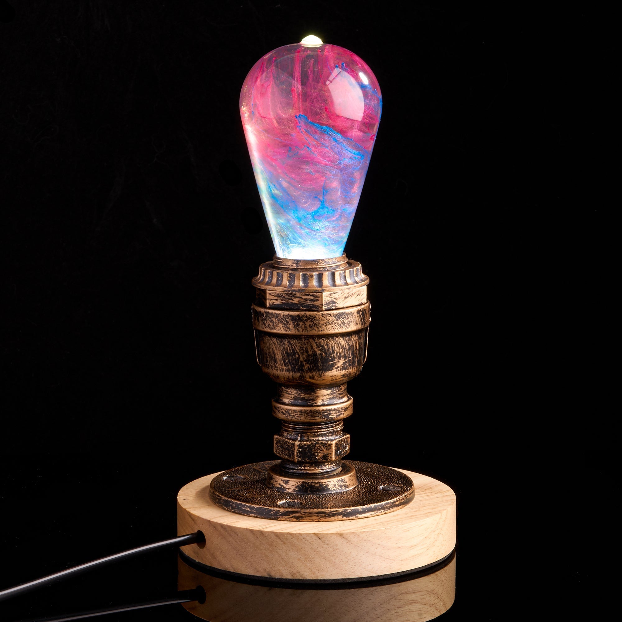 EP Light - Elsa bulb with unique frosty glow, handcrafted eco-resin design, and energy-saving LED technology.
