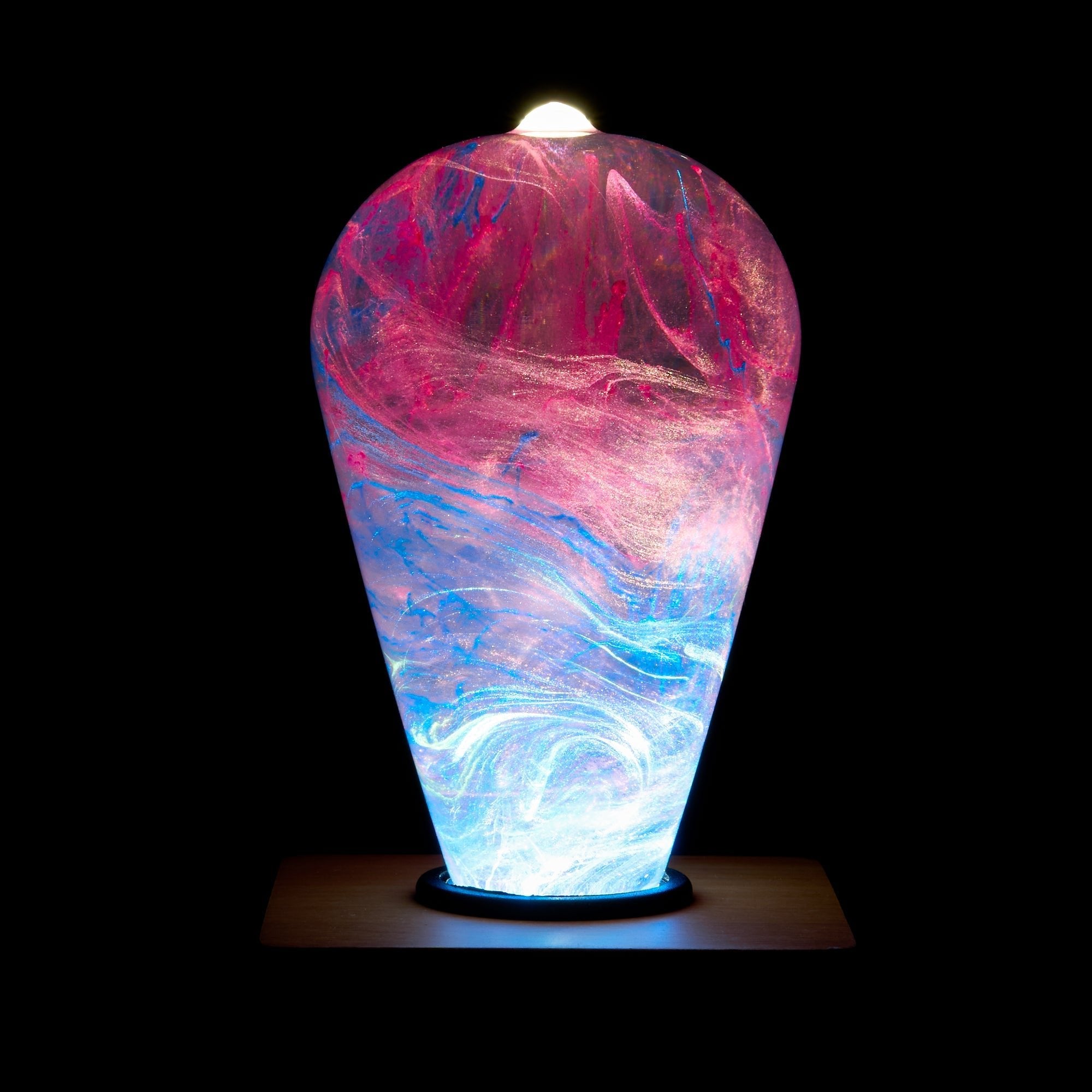 EP Light - Elsa bulb glowing with unique handcrafted blue and pink frosty patterns, eco-resin and energy-saving LED design.