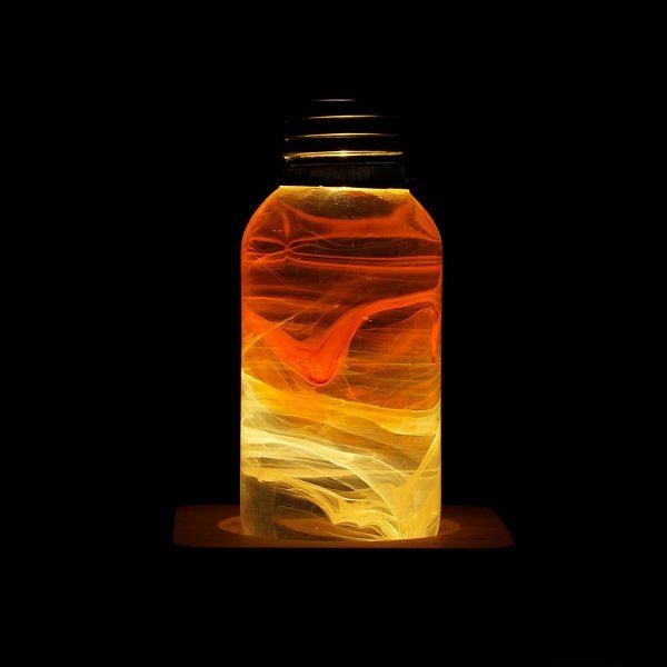 EP Light - Flame handcrafted eco-resin bulb glows with warm fiery ambiance, safe-to-touch LED with unique flame design.