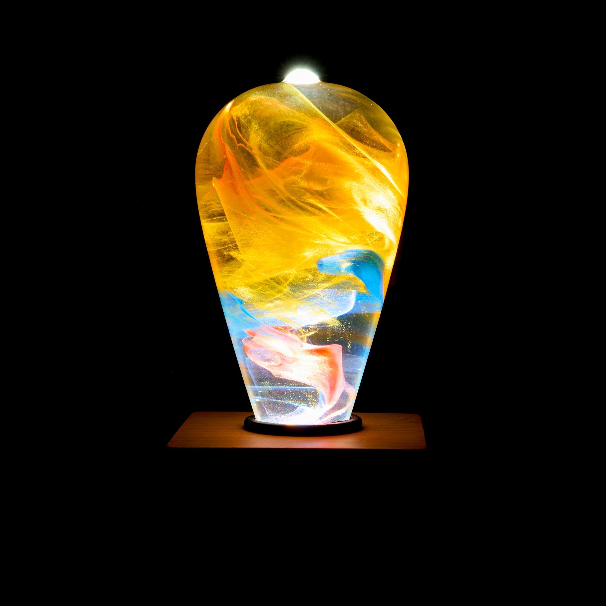 EP Light - Garden glows with vibrant, unique eco-resin patterns, combining energy-saving LED brilliance and natural beauty.