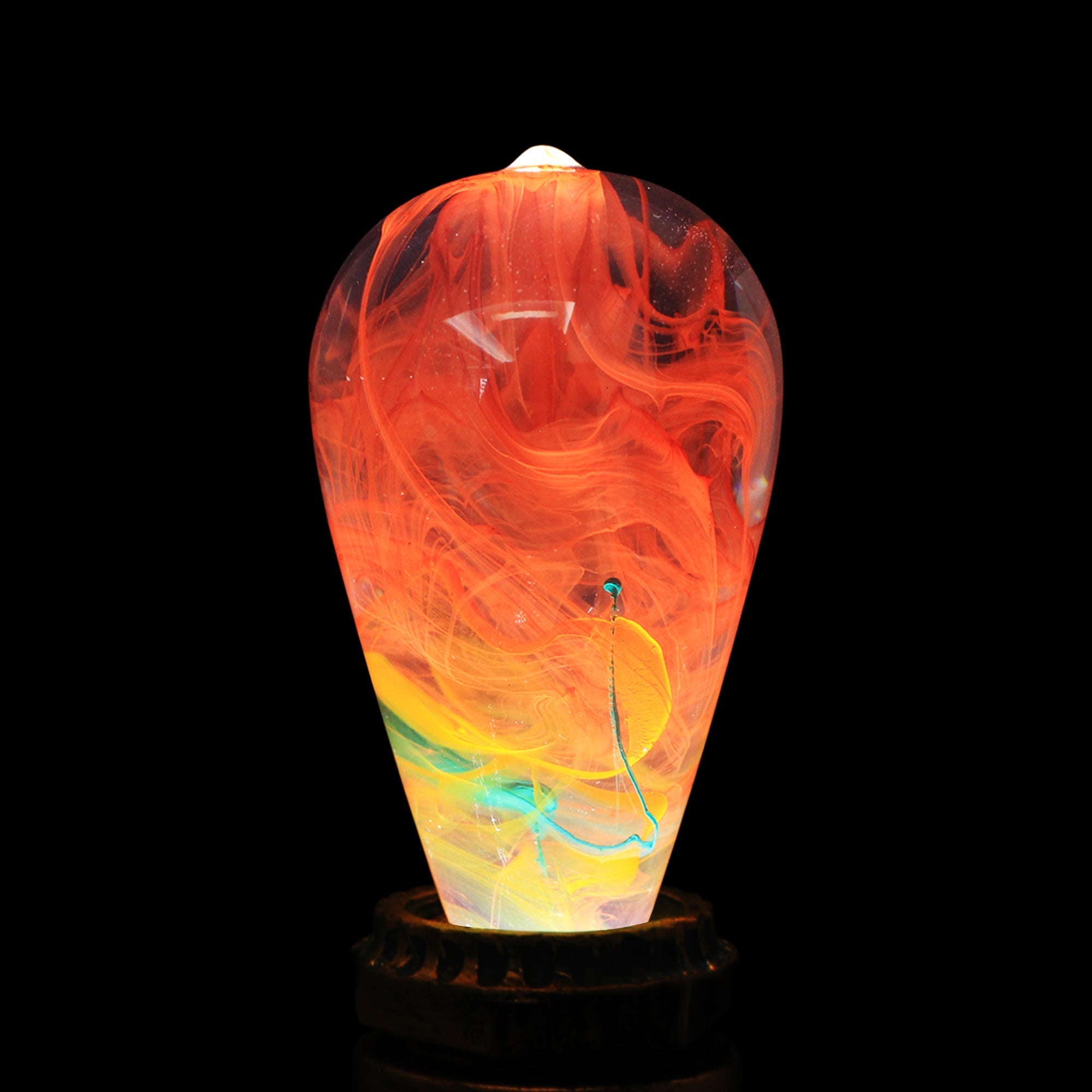 EP Light - Nebula handcrafted LED bulb with unique cosmic swirl, eco-friendly resin, fits E26/E27 sockets, glowing 6000K light.