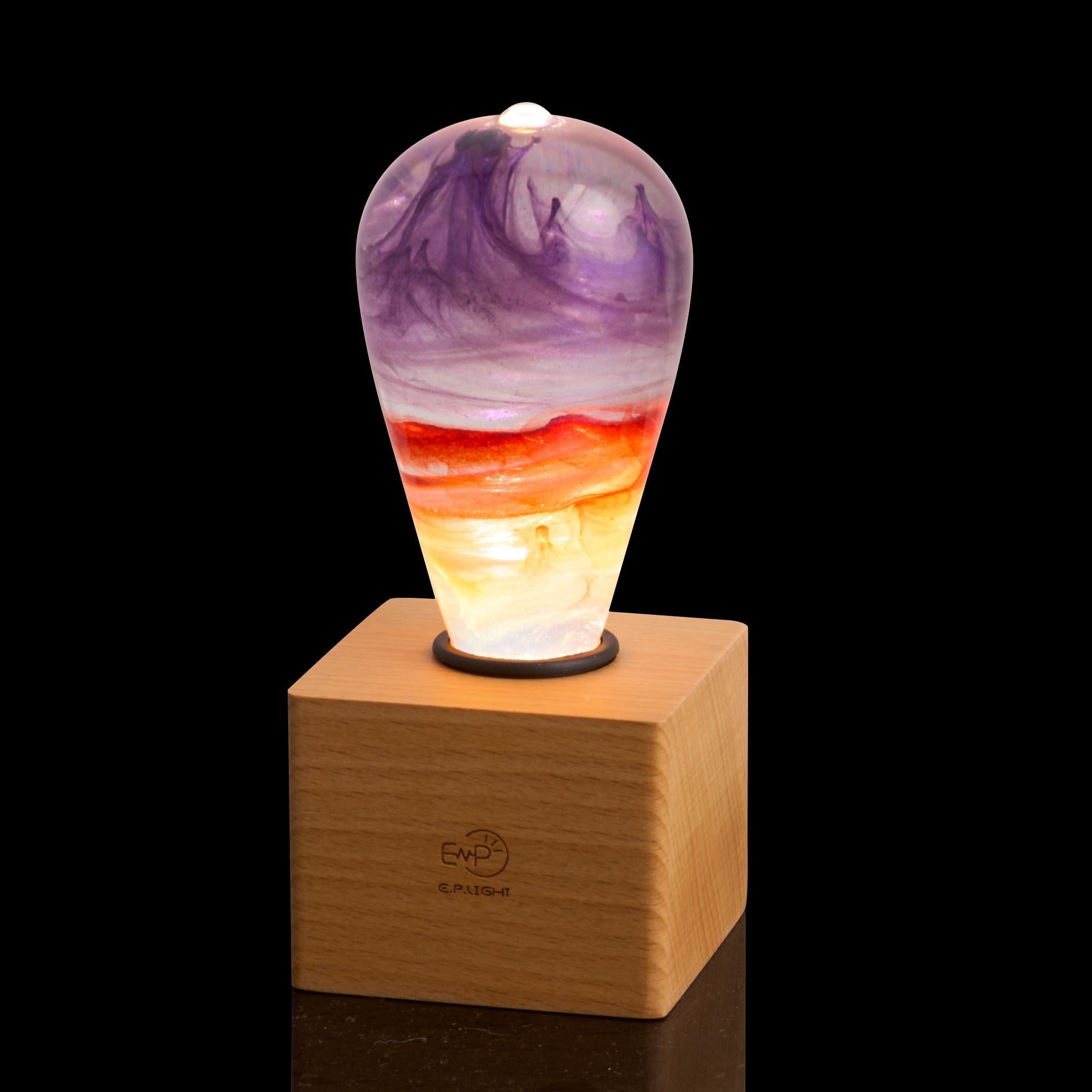 EP Light - Passion bulb with vibrant purple, red, and yellow handcrafted eco-resin design on wooden base, energy-efficient and unique.