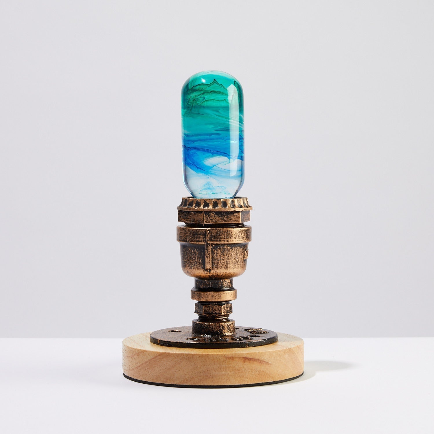EP Light - Prairie handcrafted resin bulb with unique blue-green pattern on vintage brass wood base lighting fixture