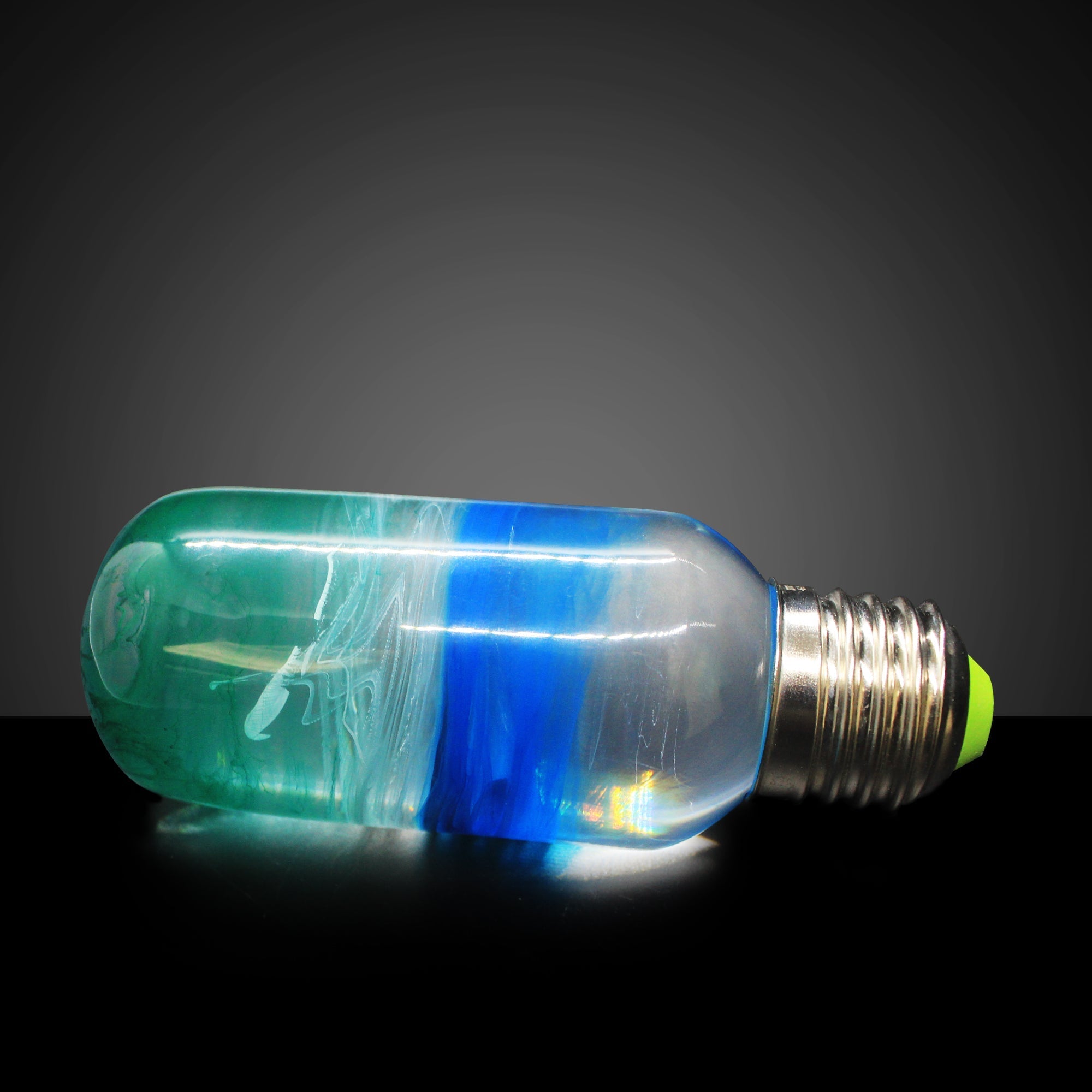 EP Light - Prairie bulb handcrafted with unique blue and green resin for artistic, energy-saving lighting.