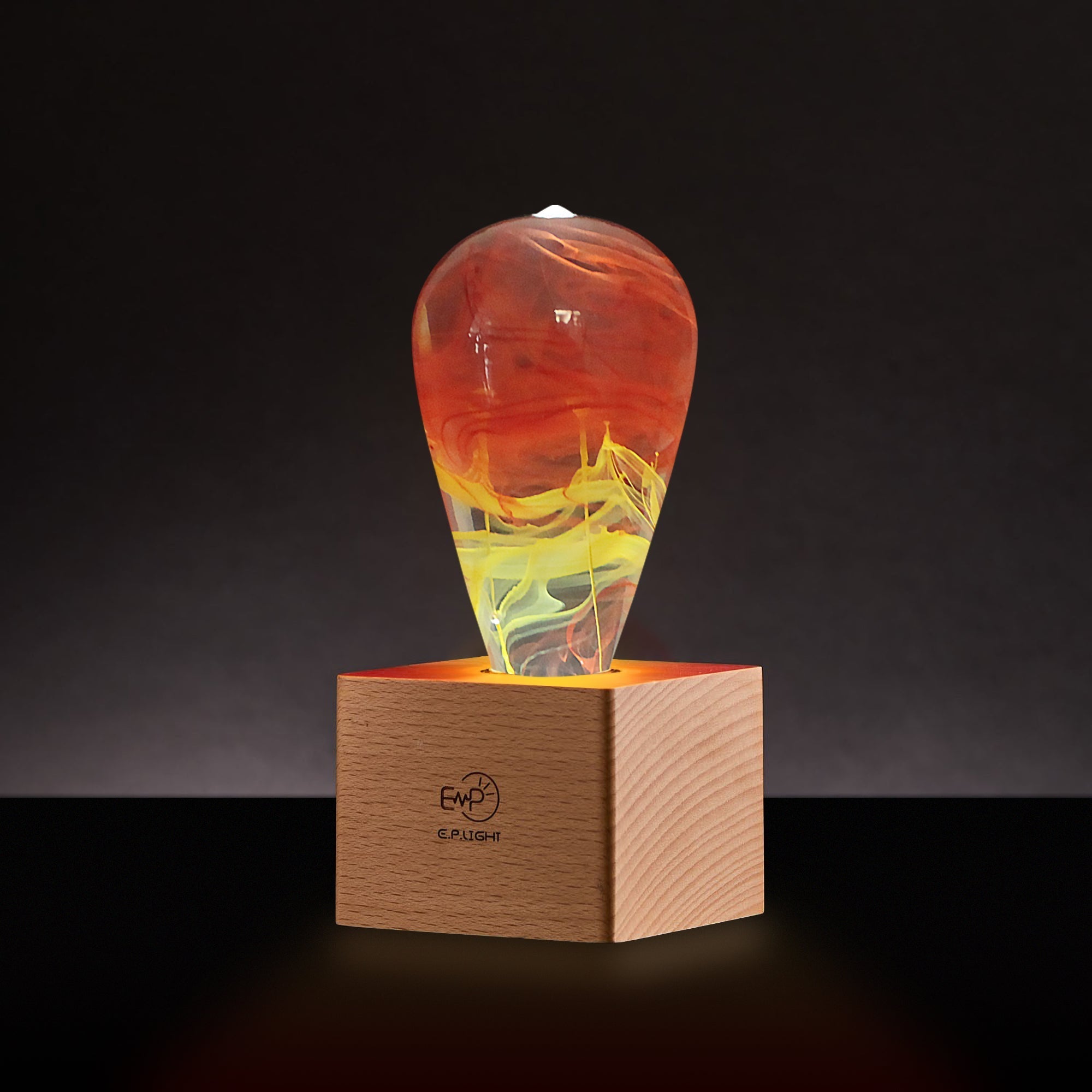 EP Light - Solar Corona eco-resin LED lamp with unique solar halo design casting warm celestial ambiance on wooden base.