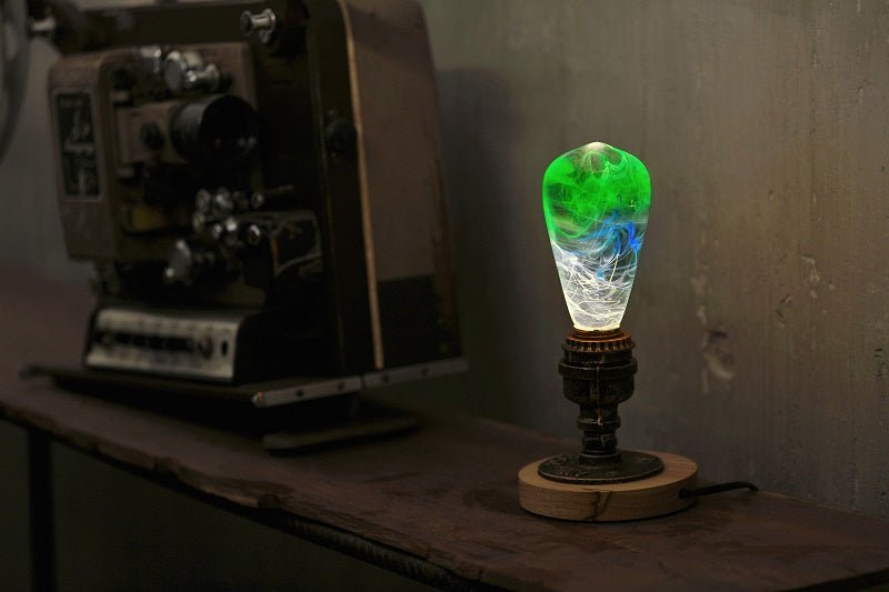 EP Light - Spring uniquely handcrafted bulb with vibrant green and blue glow, adding eco-friendly, artistic brilliance to any space.