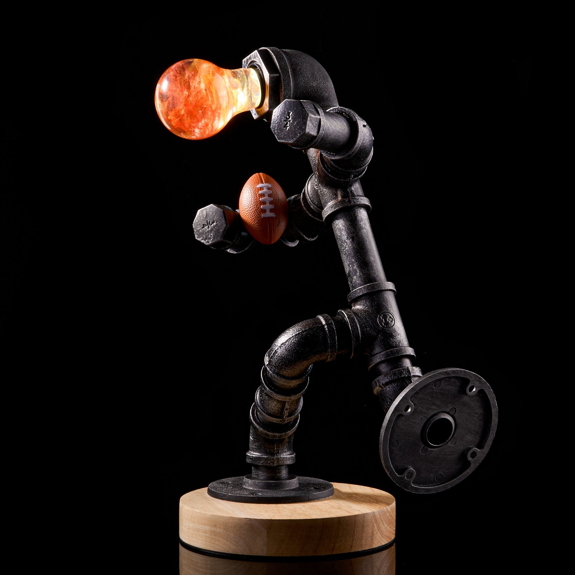 EP Light - Sunflower bulb glowing with handcrafted eco-resin design on industrial pipe lamp base.