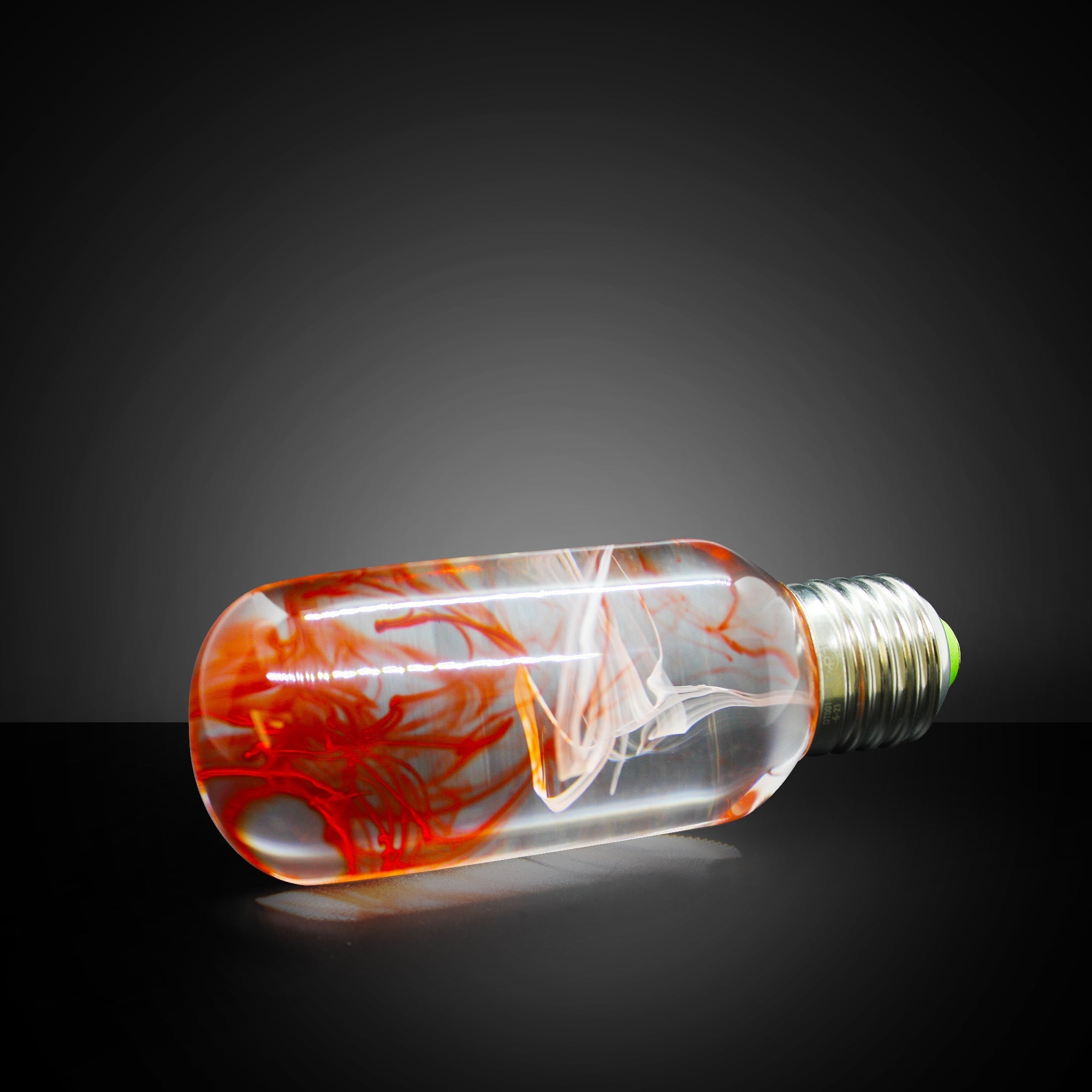 EP Light - Tango bulb with unique orange swirl design, eco-resin, energy-saving, drop-resistant, fits E26/E27 lamp bases.