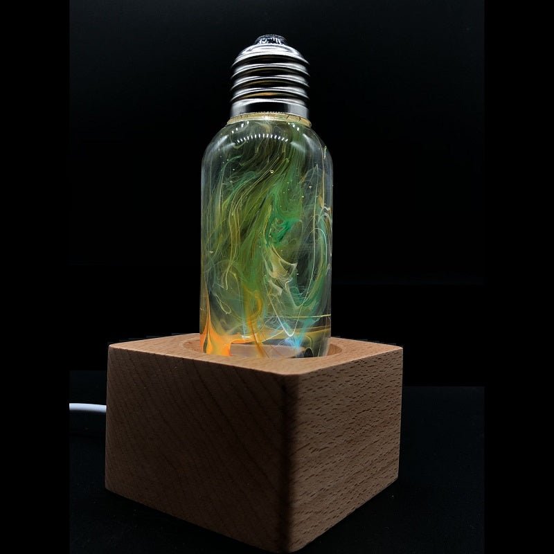 EP Light - Time handcrafted eco-resin bulb with unique swirling patterns, cool to touch and energy-saving design.