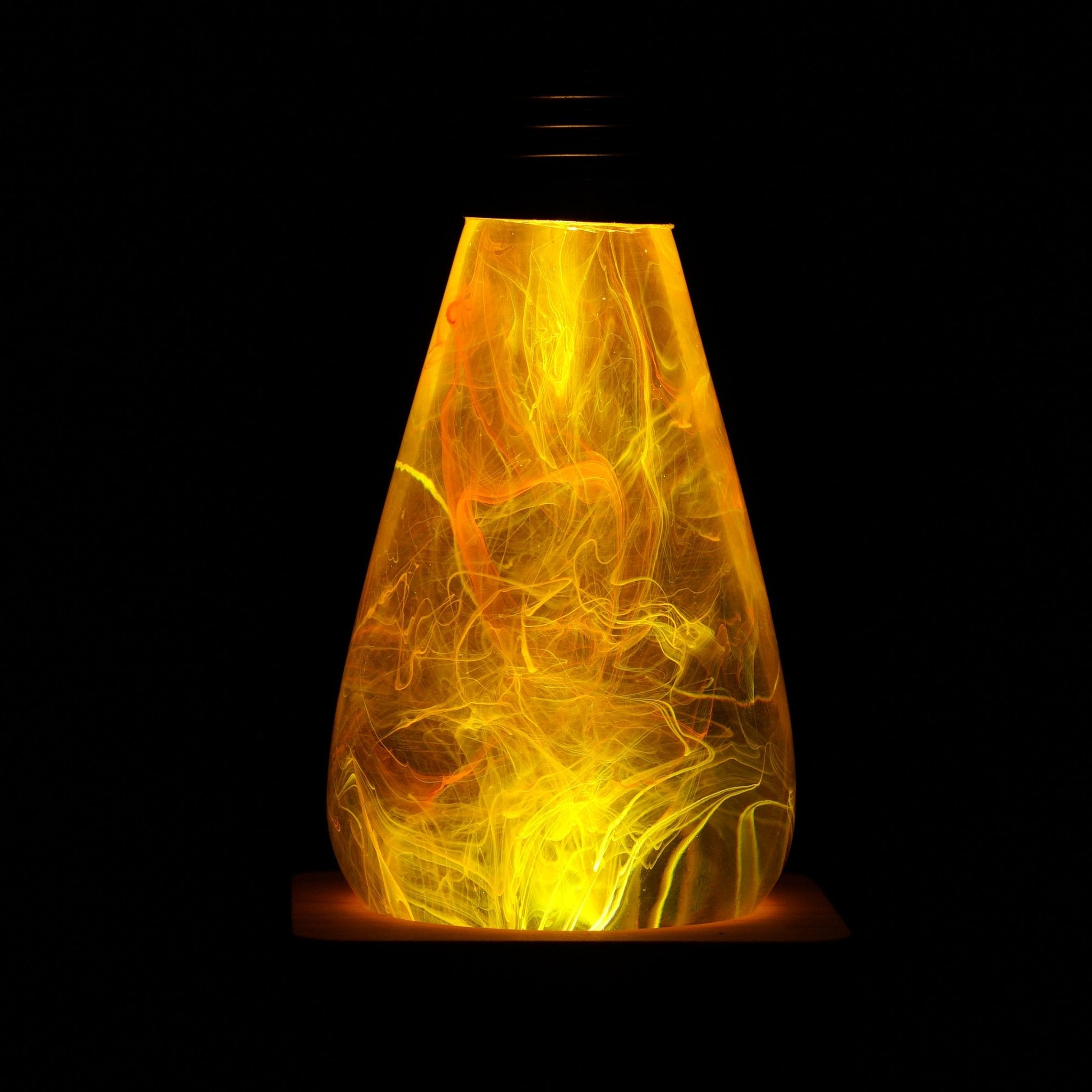 EP Light - Twilight lamp glowing warmly, handcrafted eco-resin with unique sunset-inspired LED illumination.