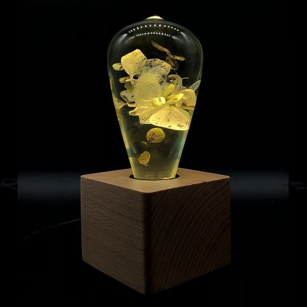 EP Light - White Hydrangea bulb with handcrafted eco-resin design, glowing elegant floral details on wooden base.