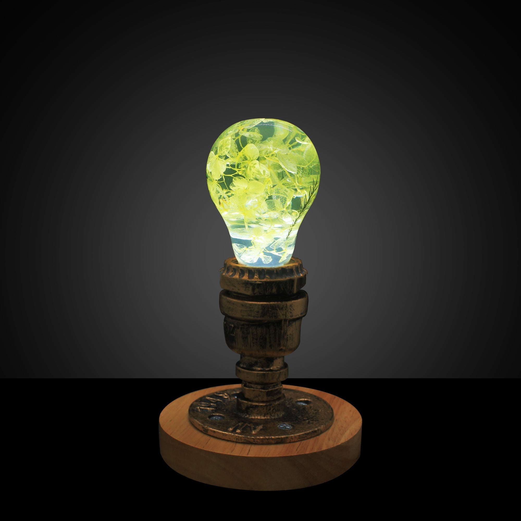 EP Light - Yellow Hydrangea glowing LED bulb with unique handcrafted floral design brightening a cozy space.