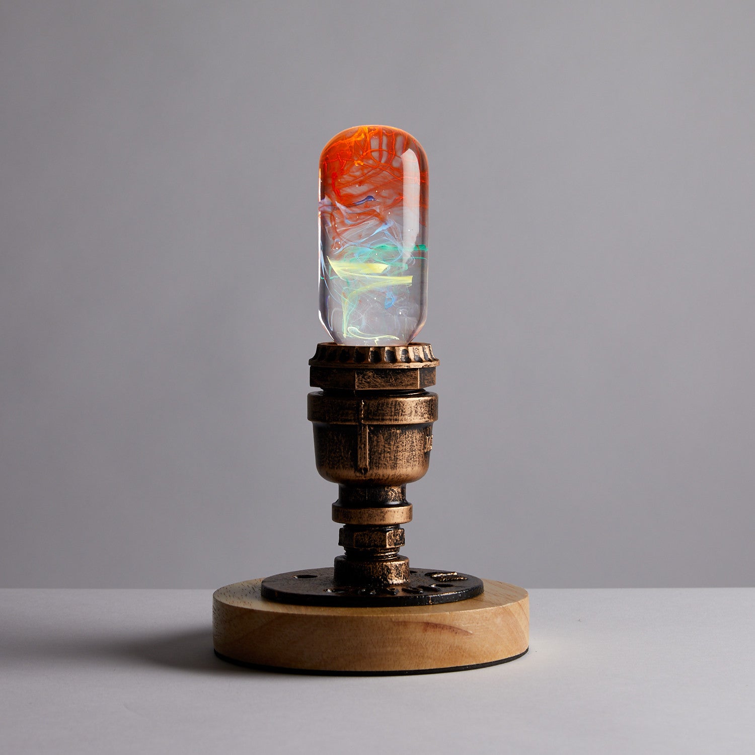 EP Light - Youth tubular bulb with unique colorful resin design on vintage metal and wood base lighting decor.