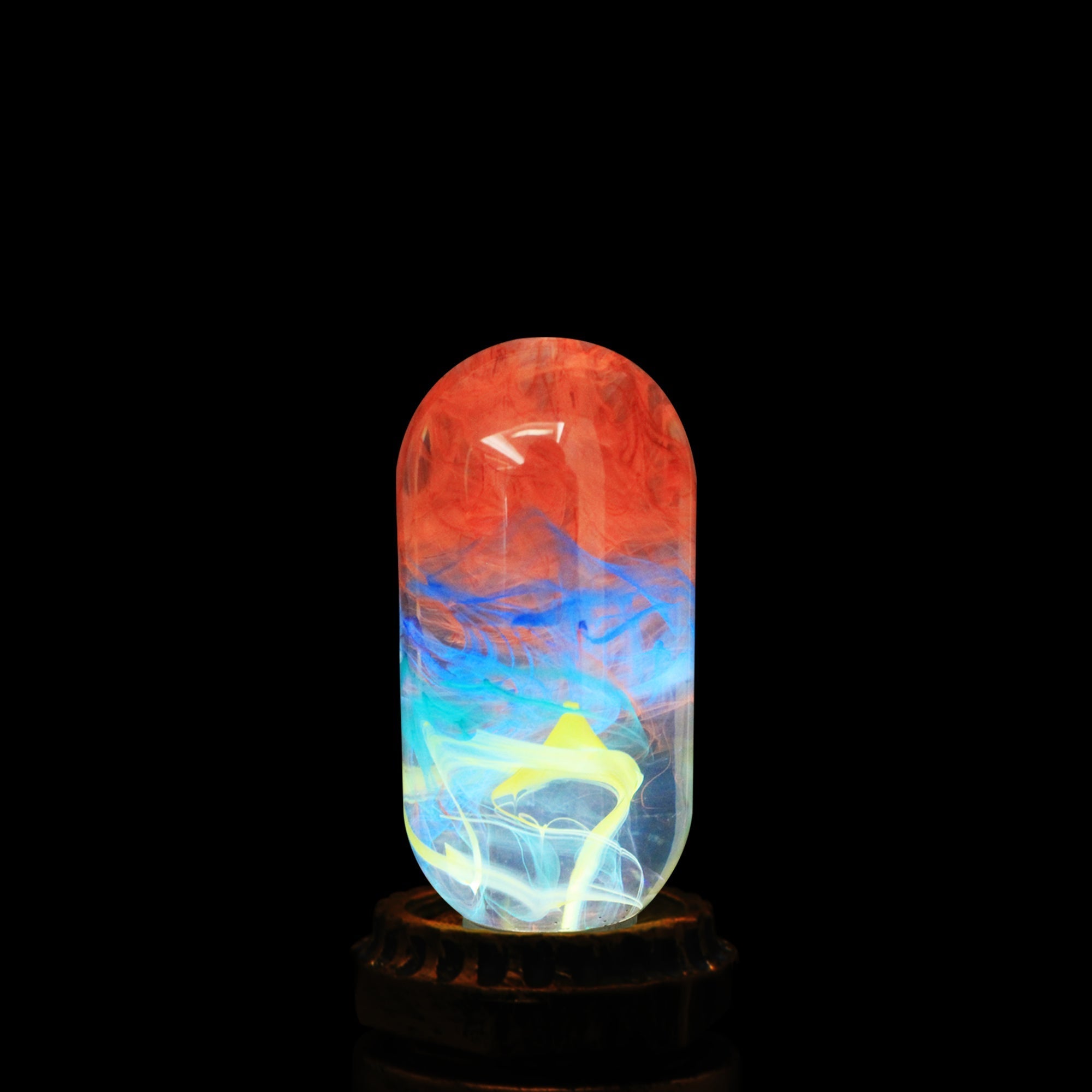 EP Light - Youth tubular LED bulb with unique red, blue, and white resin design glowing on dark background.