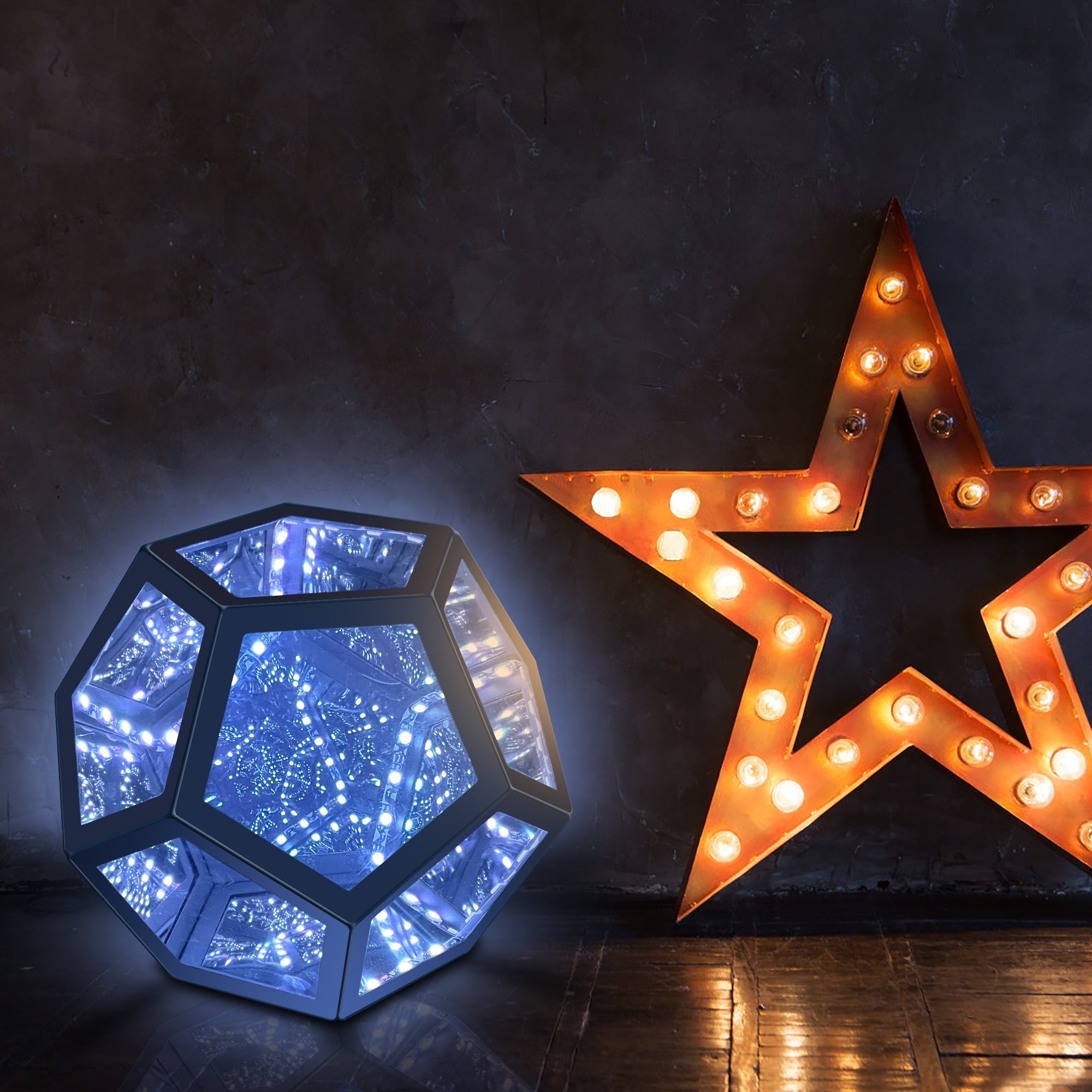 Geometric Infinity Lamp (RGB) glowing with infinite light tunnels next to a vintage star marquee light on dark floor.