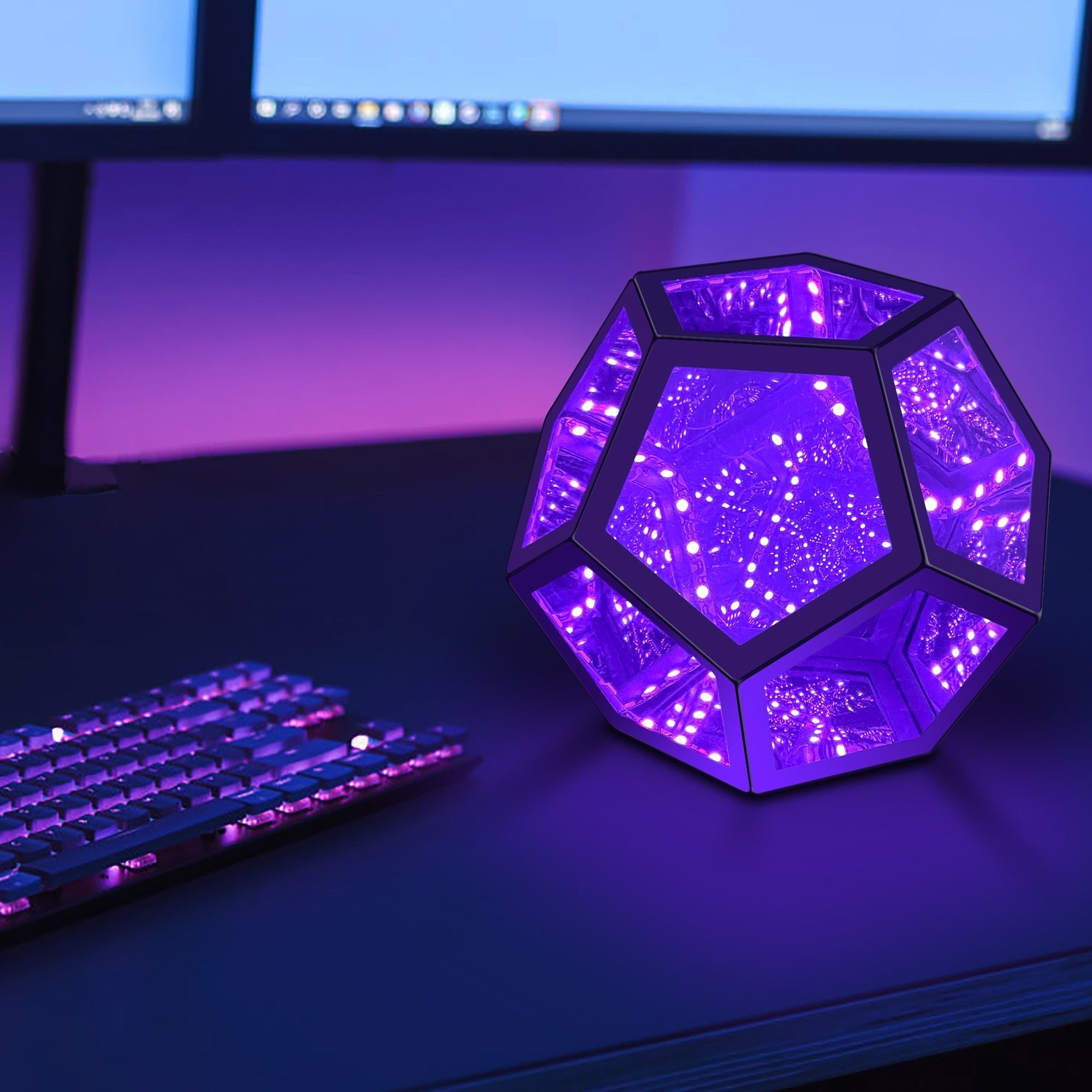 Geometric Infinity Lamp (RGB) glowing purple on desk with keyboard, creating infinite light tunnel and vibrant mood lighting.