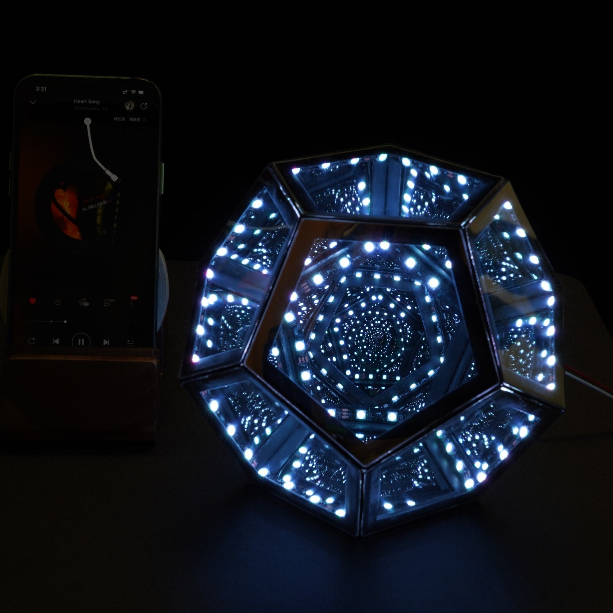 Geometric Infinity Lamp (RGB) glowing bright with infinite light tunnel effect, perfect for mood lighting and game room decor.