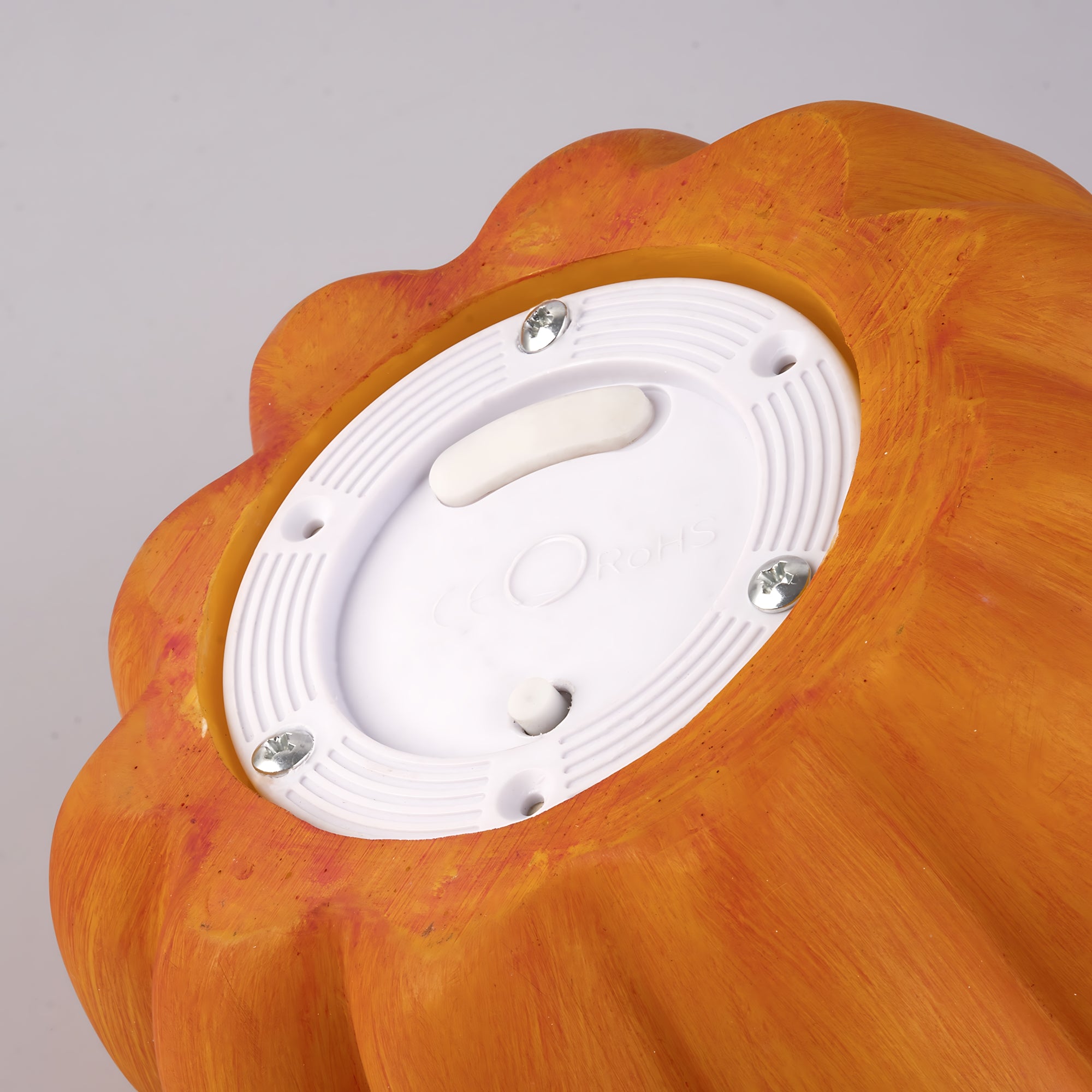 Bottom view of Indoor & Outdoor Pumpkin Lantern showing sturdy, rechargeable, weather-resistant design for festive fall decor.