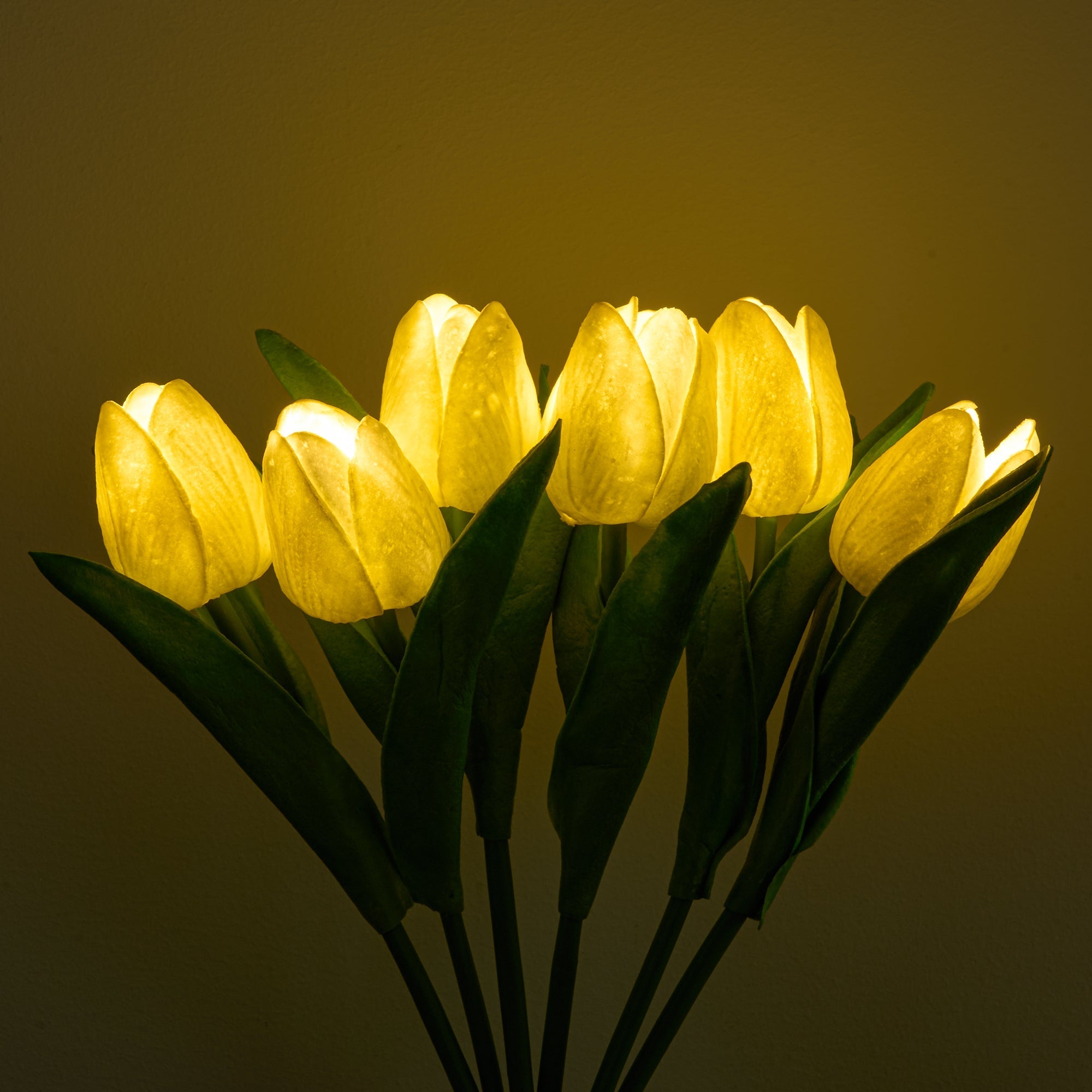 LED Tulip Bouquet Light glowing warmly, realistic tulip petals and green leaves, perfect elegant bedroom decor lamp.