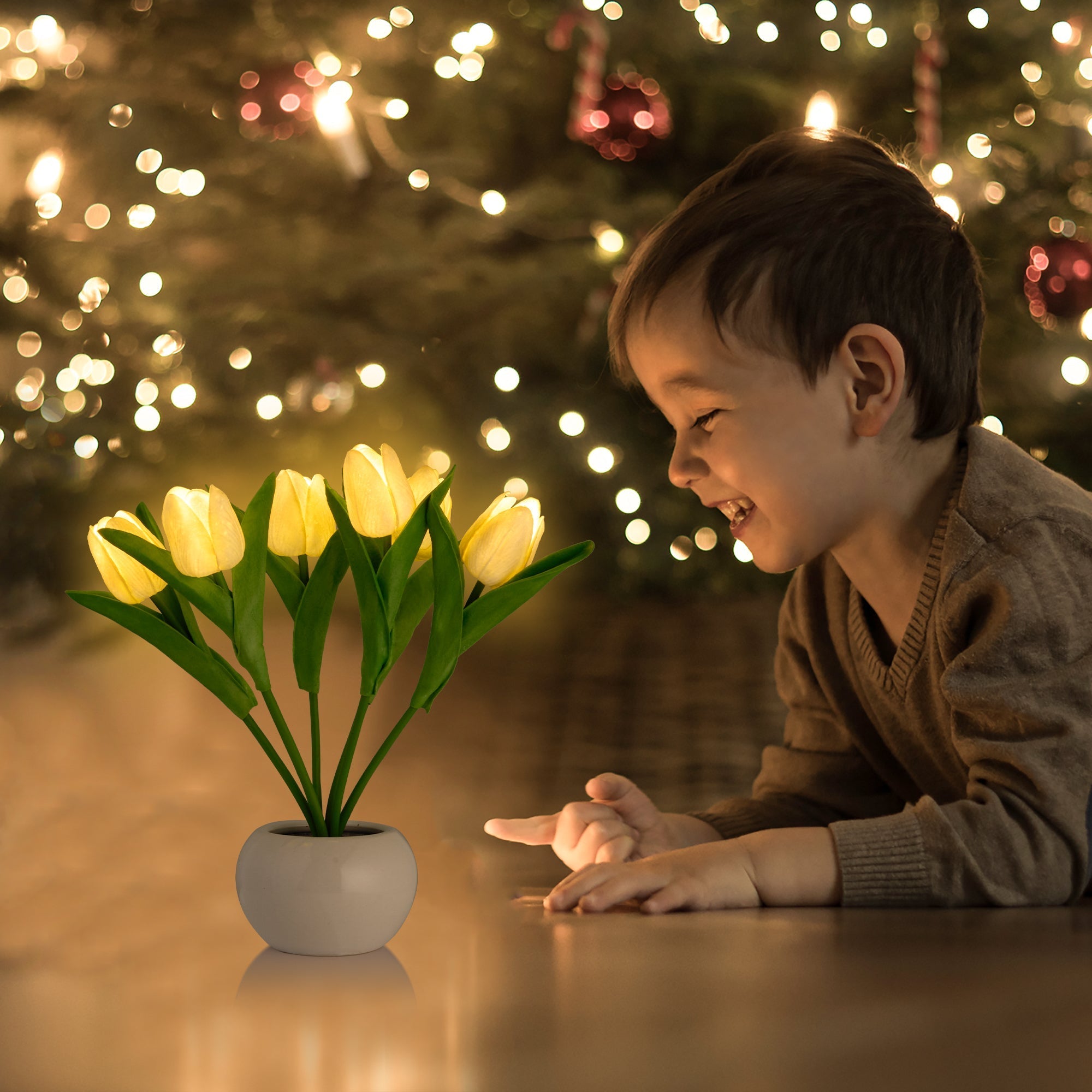 LED Tulip Bouquet Light with warm glowing PU tulips in a ceramic base creating cozy ambient decor.