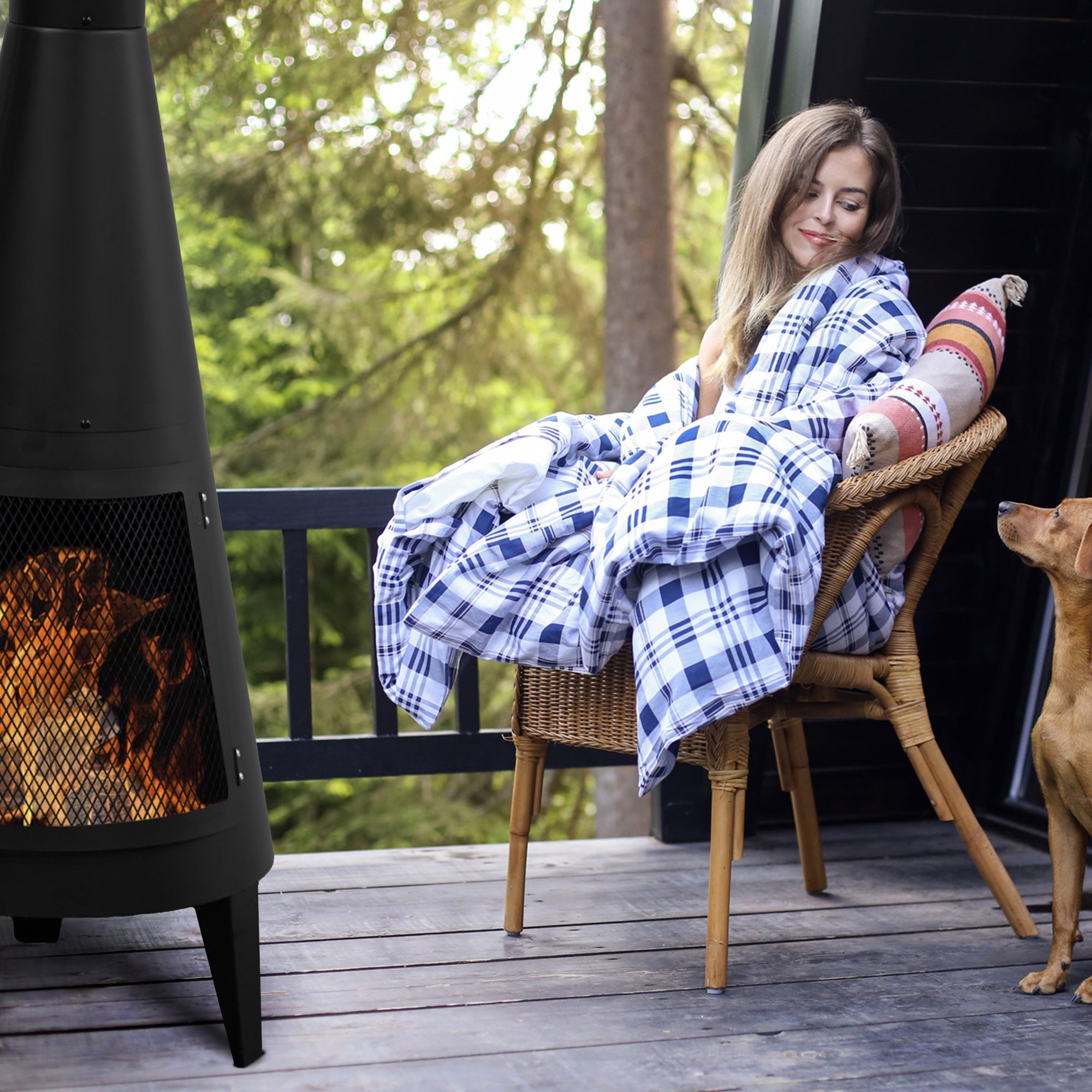 Modern Mesh Chiminea Fireplace warming a cozy outdoor patio with stylish wood burning fire on a cool evening.