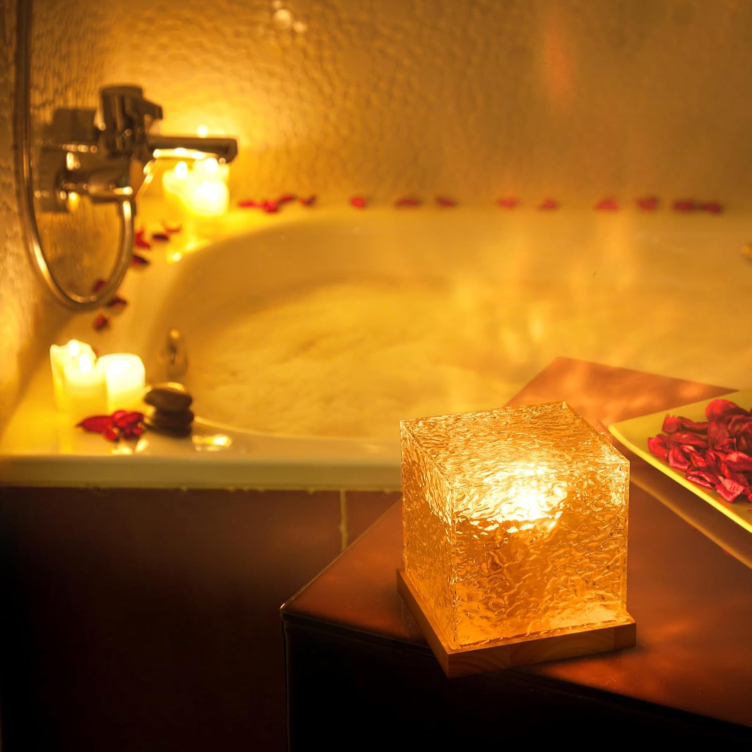 Ocean Wave Projector Light casting warm, calming ambiance near bathtub with candles for ultimate relaxation.