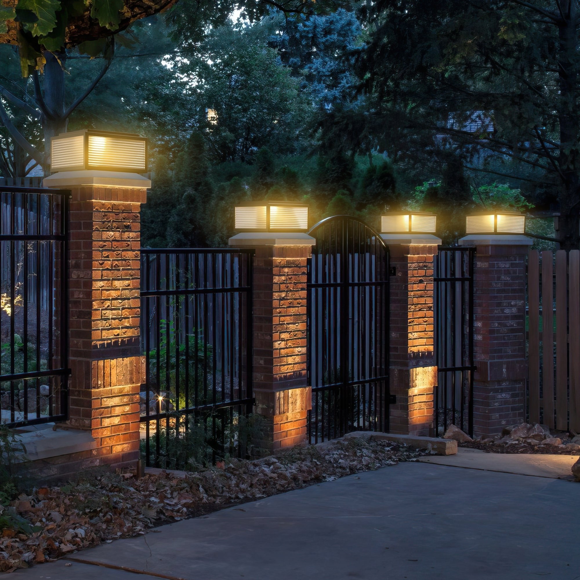 Outdoor Solar Powered Post Cap Lights illuminating brick pillars with warm, customizable garden lighting for elegant outdoor ambiance.