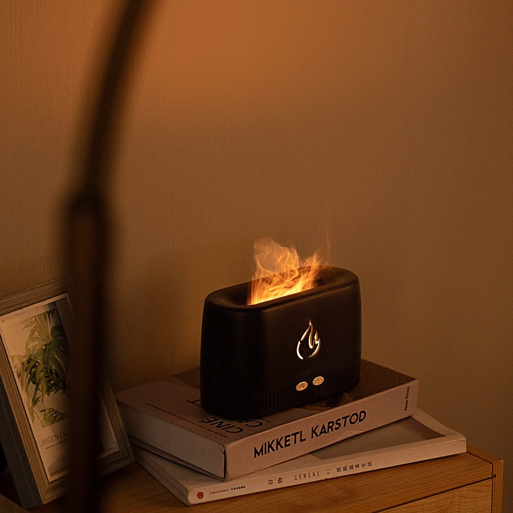 Portable Flame Diffuser & Humidifier emitting soothing flame glow and mist, perfect for relaxation and ambiance anywhere.