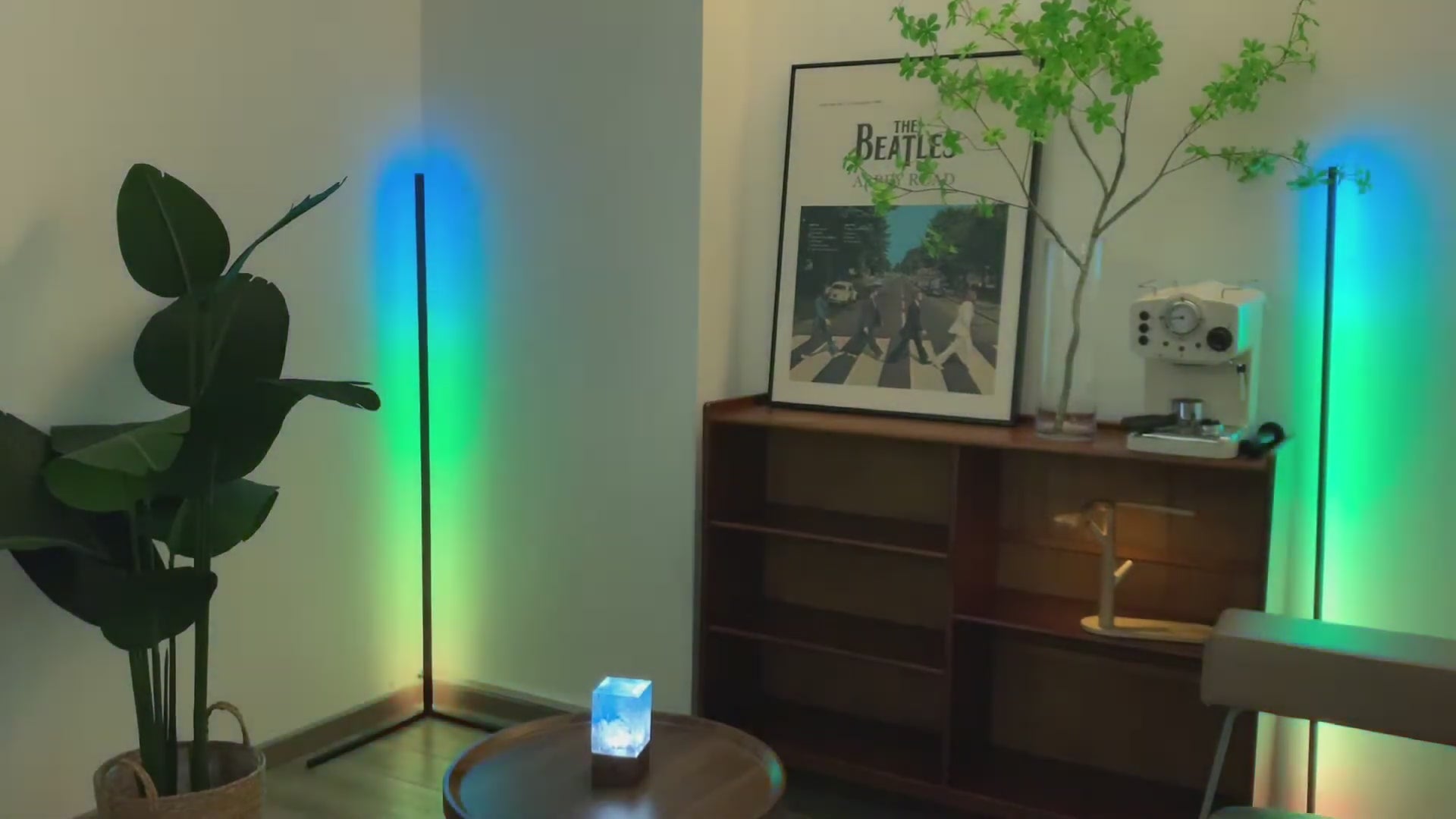 Load video: Minimalist RGB corner floor lamp with 16 million colors and remote control, enhancing modern home lighting ambience
