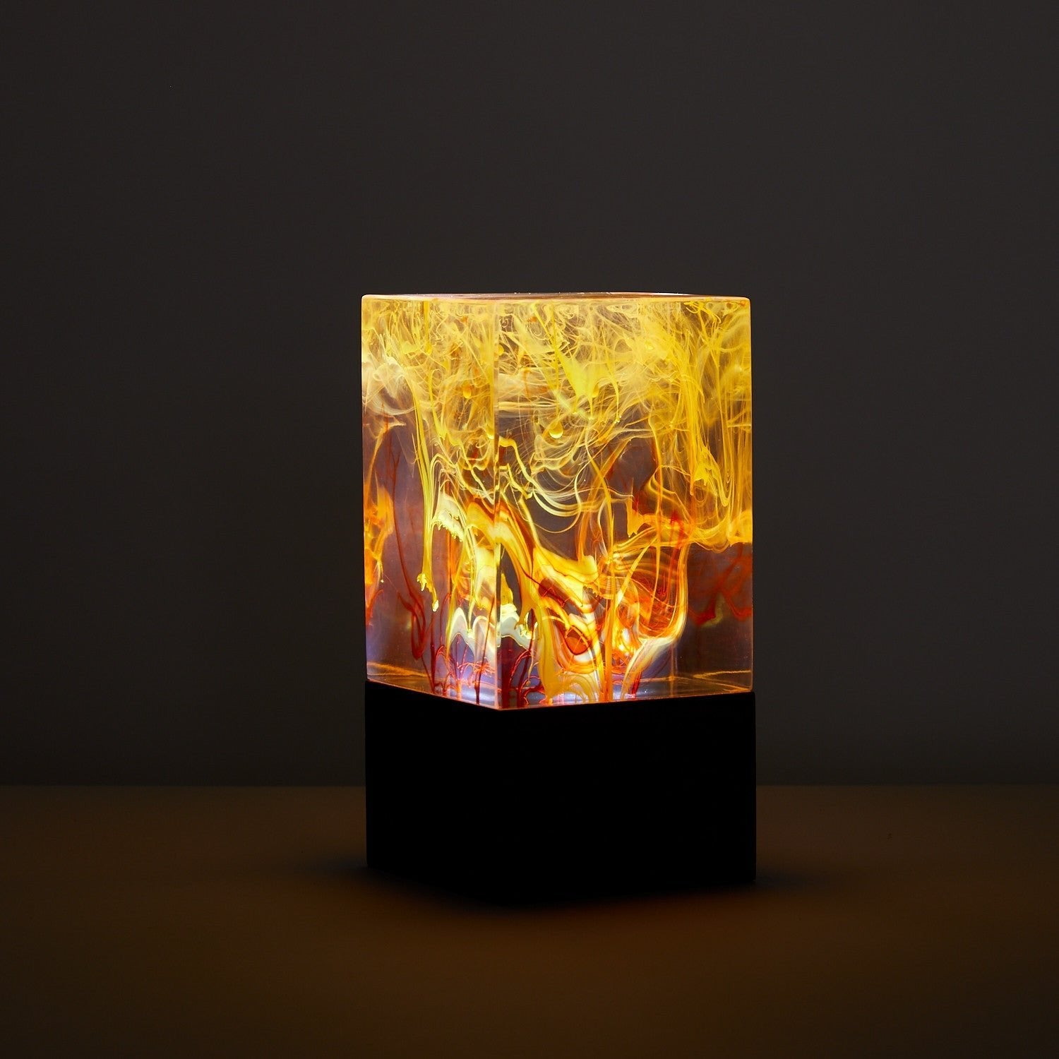 Resin Cube Table Decor - Solar glowing with warm white light, creating a serene, cosmic ambiance for any room.