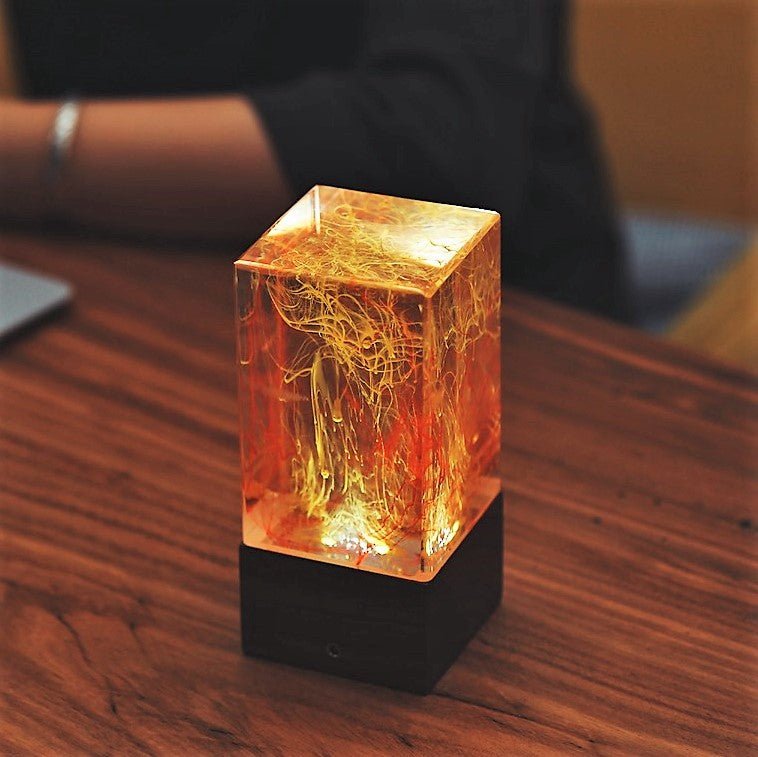 Resin Cube Table Decor - Solar emits a warm cosmic glow with handcrafted resin design for serene ambiance.