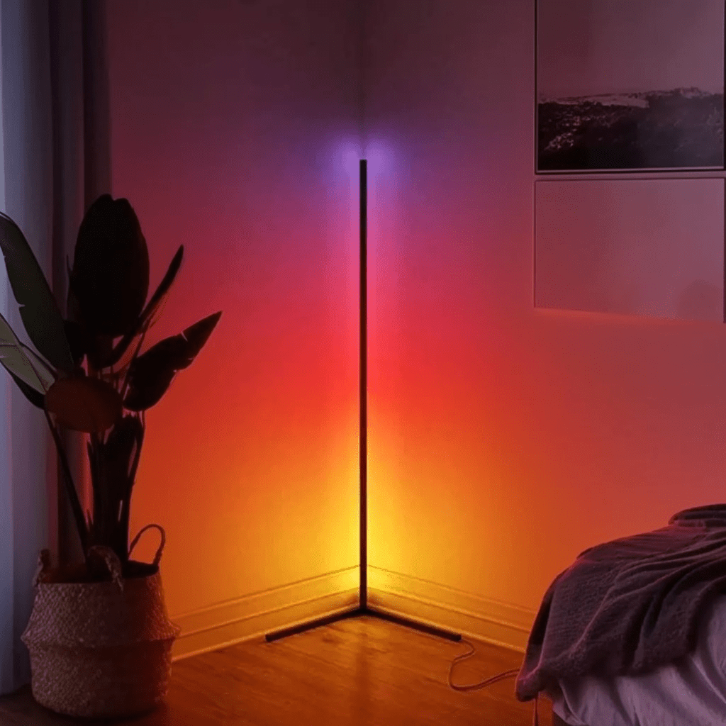 RGBCW Corner Floor Lamp illuminating a room corner with vibrant RGB lighting and sleek minimalist design.