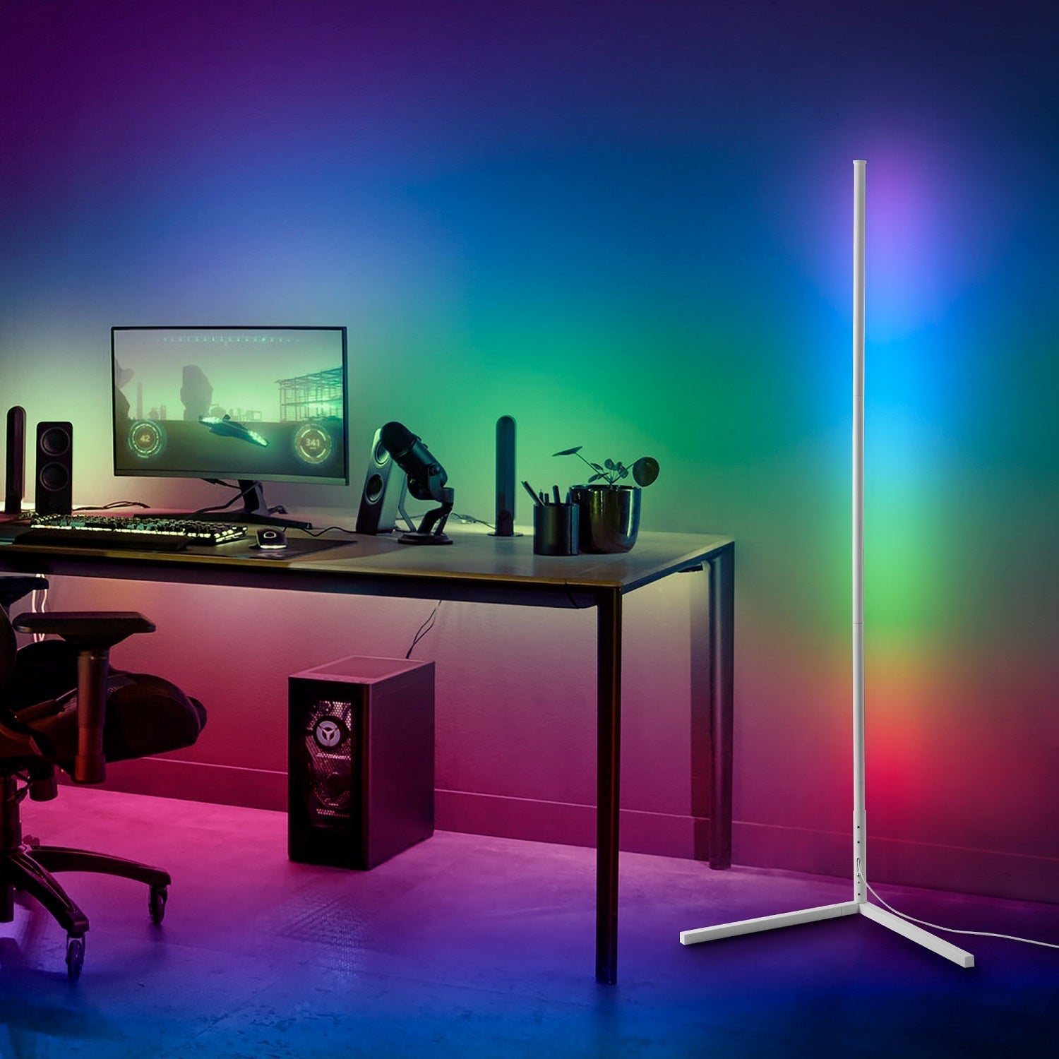 RGBCW Corner Floor Lamp - White illuminating a modern gaming setup with vibrant RGB and cool white lighting.